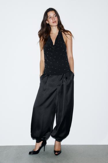 PANTALONS SETINATS AMB PLECS I ESTIL BOMBACHO - Negre de Zara