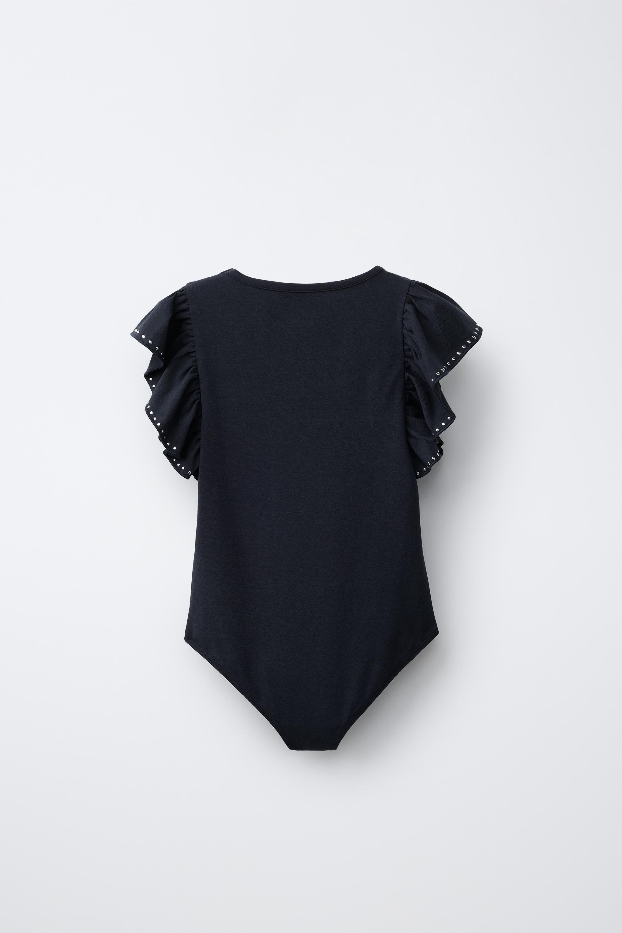 RUFFLED BODYSUIT WITH STUDS AND MODAL