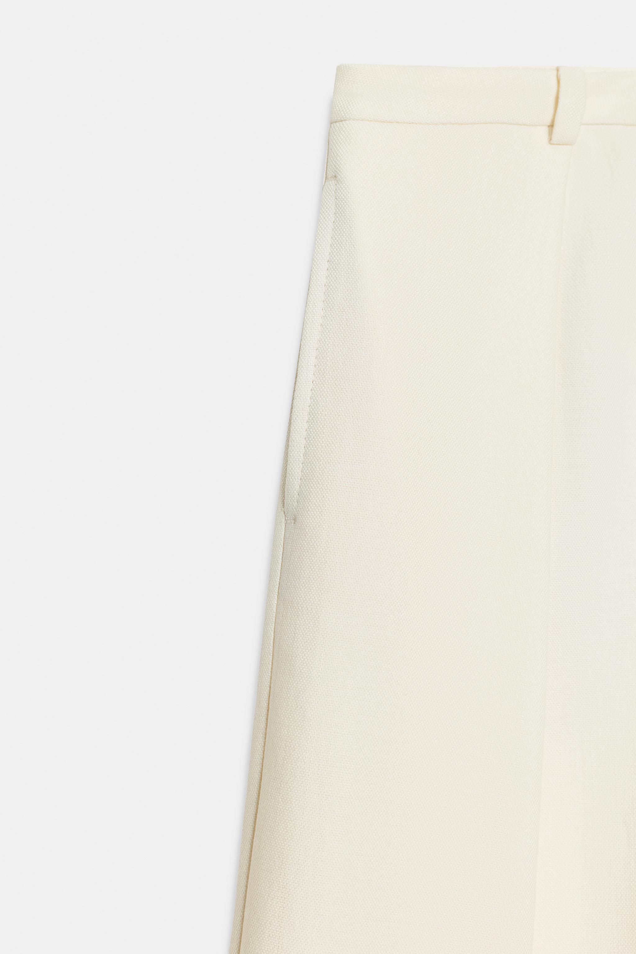 VOLUME PLEATED PANTS
