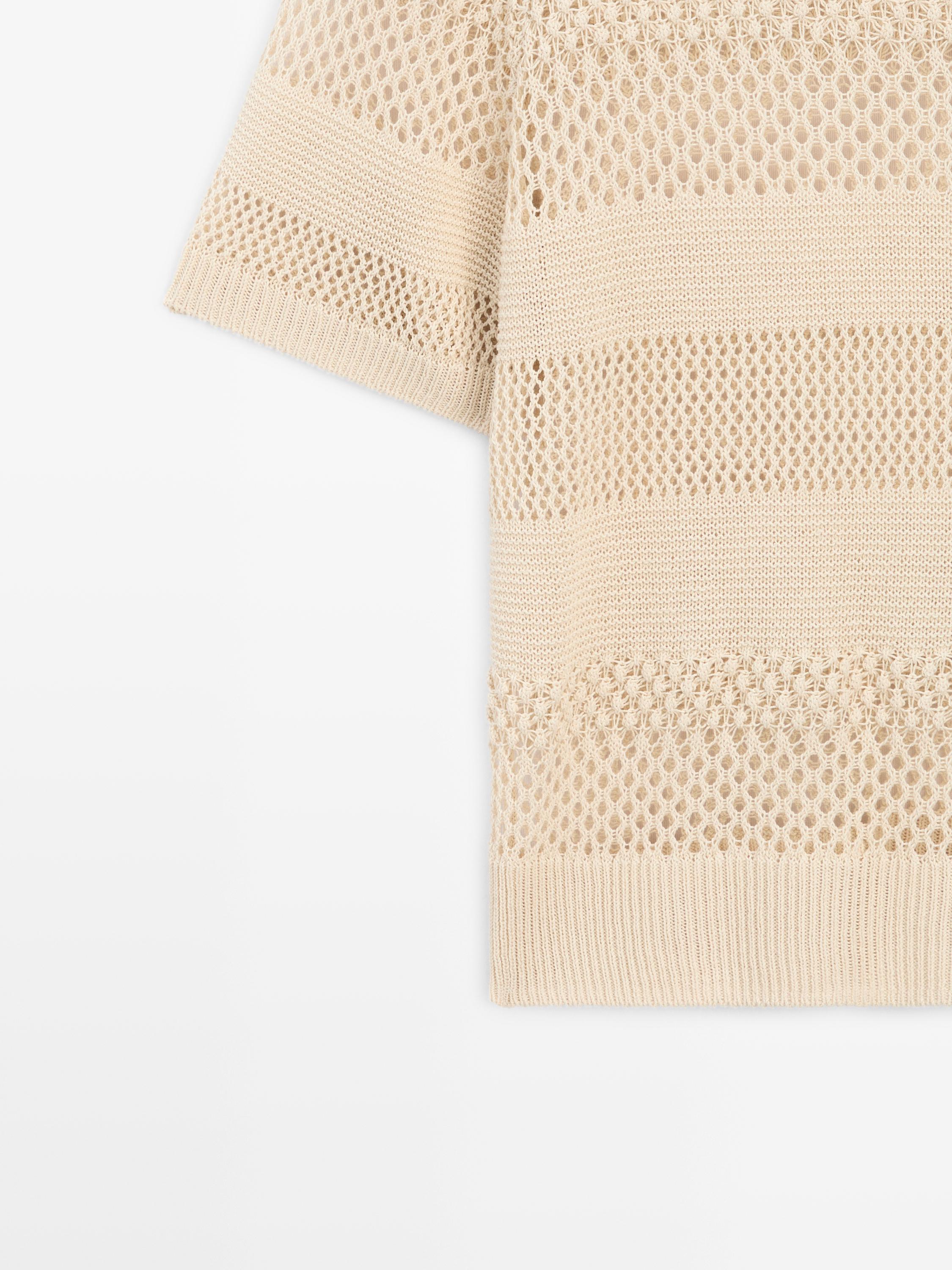 Top en maille ajourée à manches courtes
