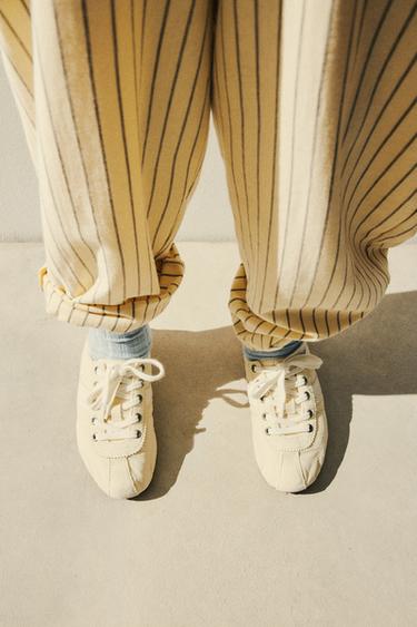RELAXED STRIPED TROUSERS - Yellow by Zara
