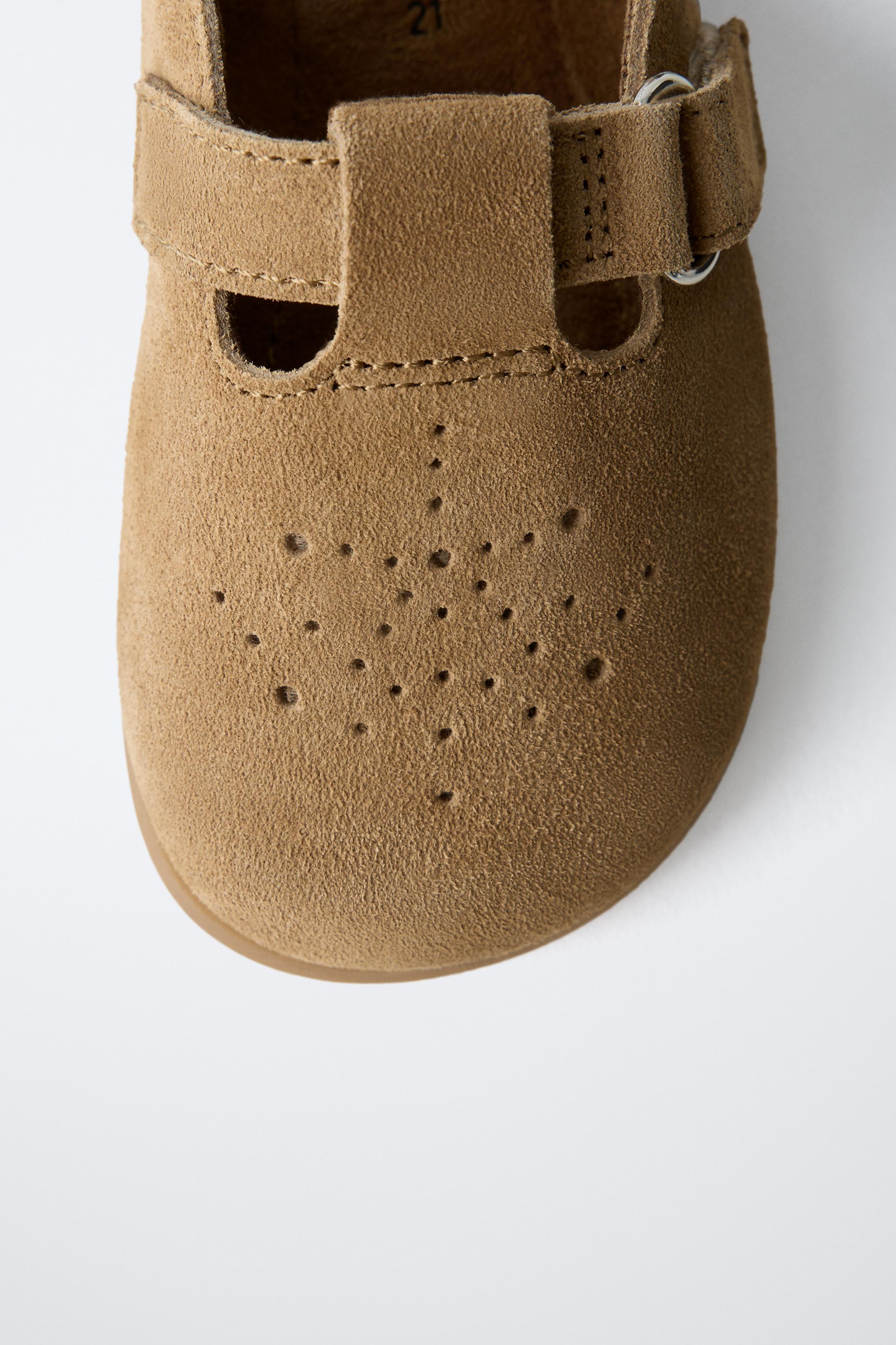 SABOTS EN CUIR