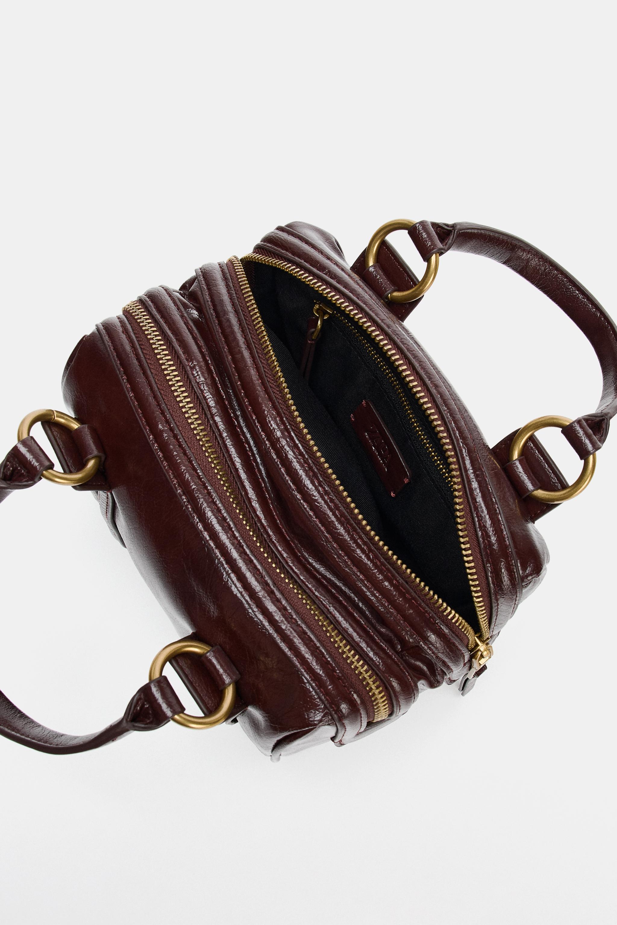 SAC À MAIN À DÉTAILS MÉTALLIQUES