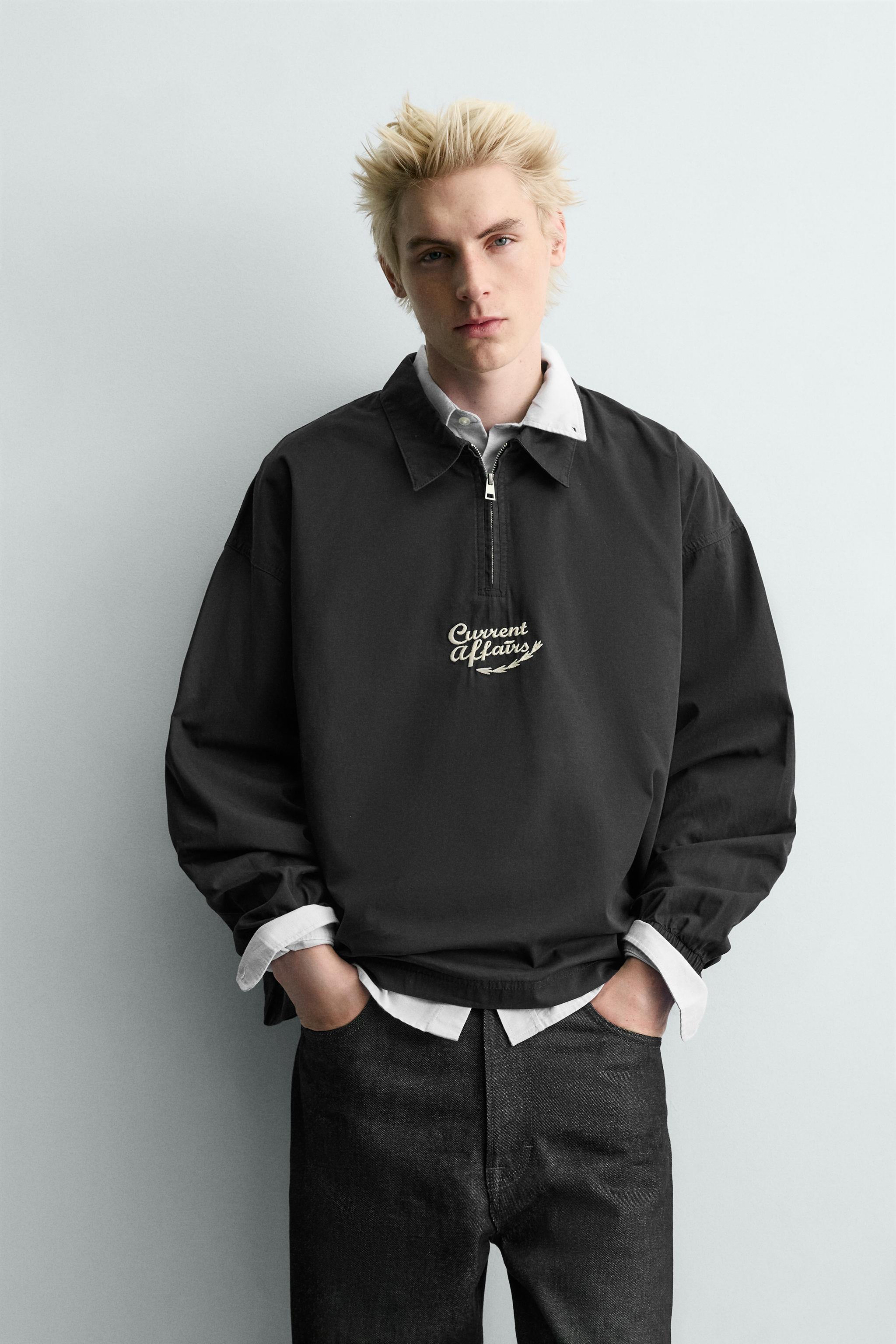 POLO À ZIP BRODÉ