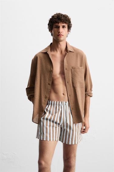 MAILLOT DE BAIN MOYEN RAYURES - Bleu ciel de Zara - Image 1
