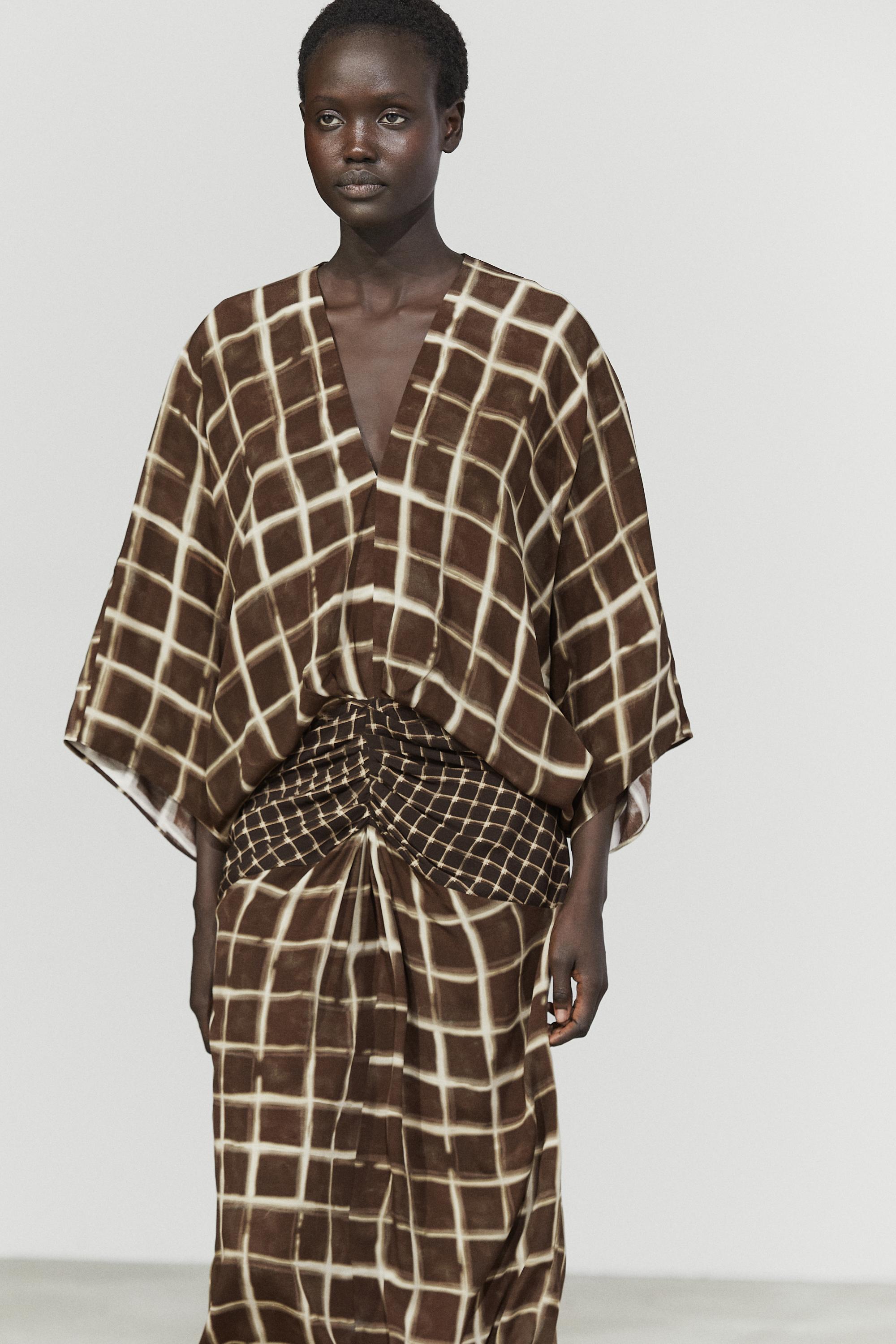 Flowy dress with printed sash detail