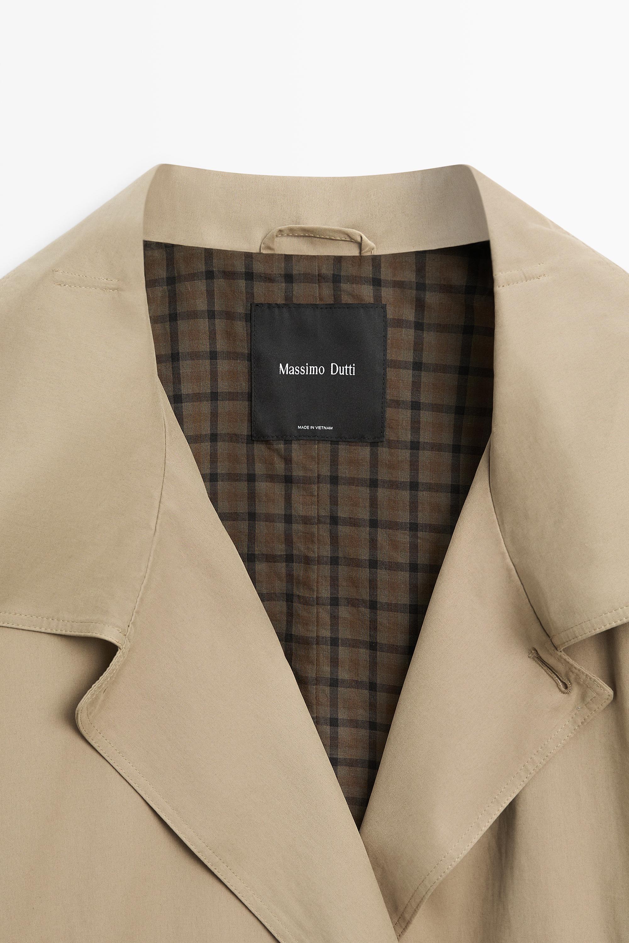 Long buckle-detail trench coat