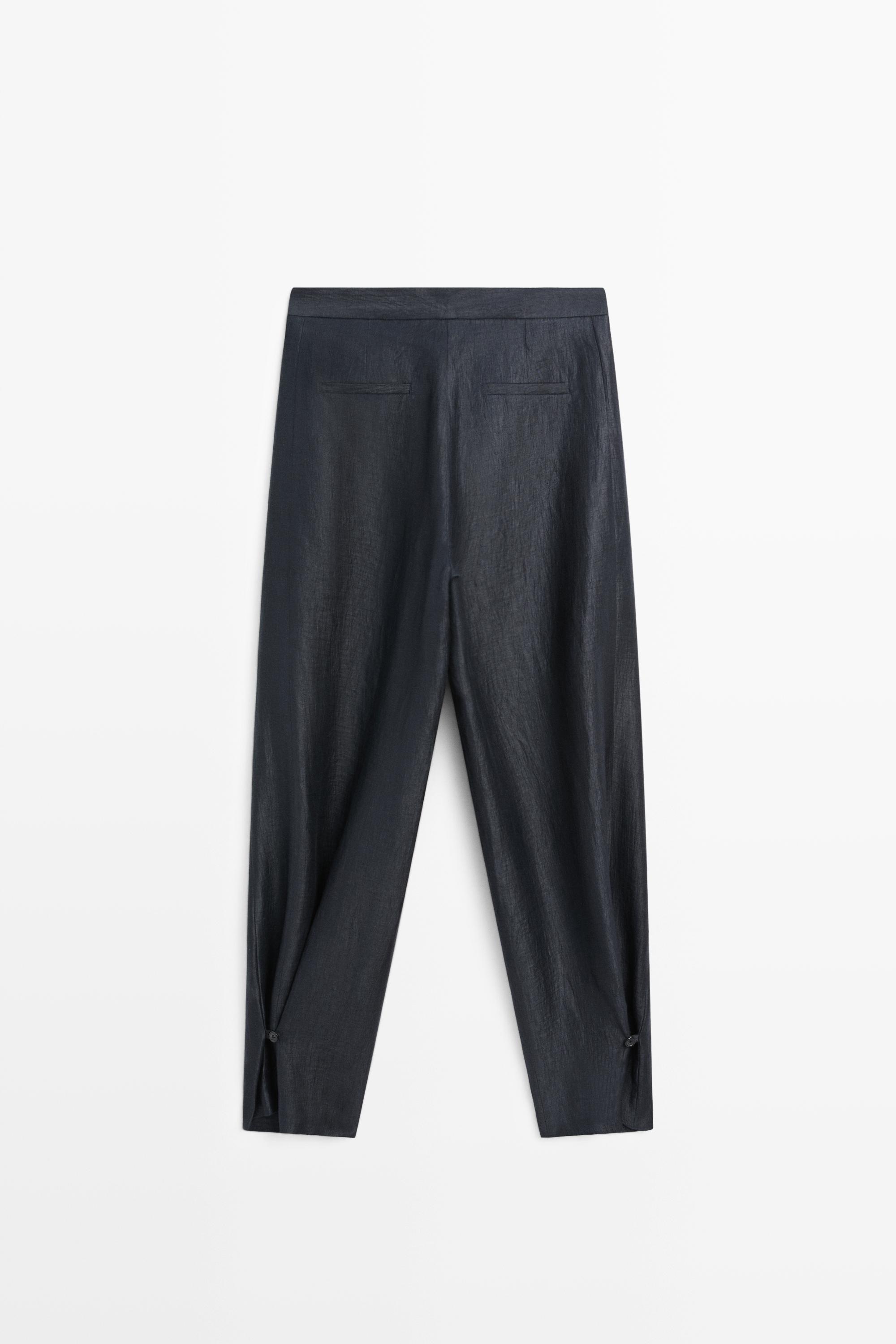 Trousers with gathered hems