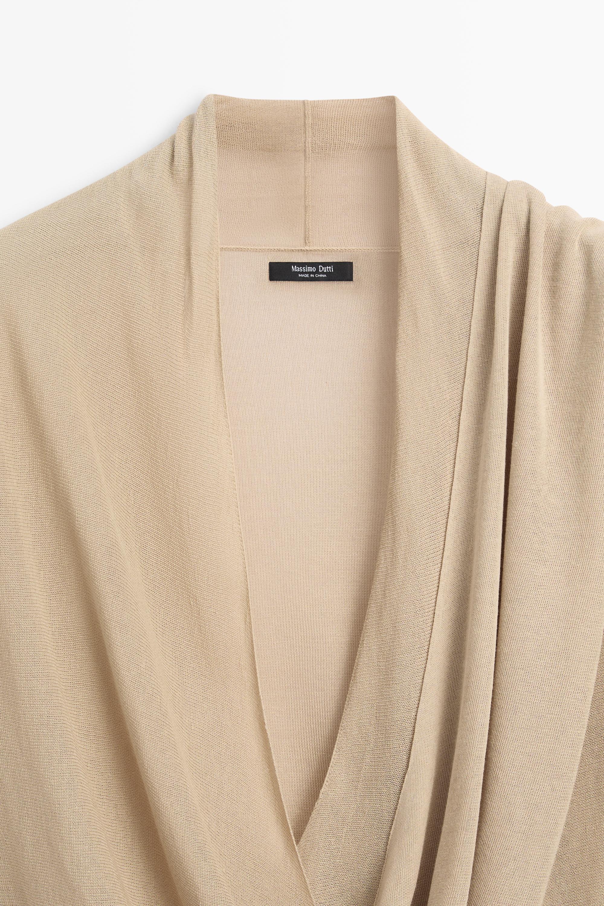Cardigan en maille à détail drapé croisé
