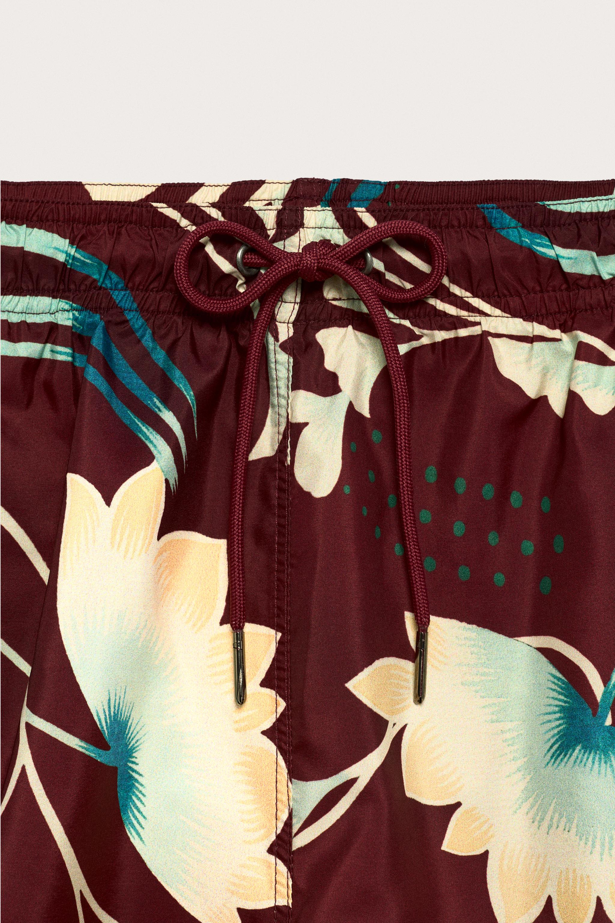 LIMITED EDITION MIXED PRINT SWIM SHORTS