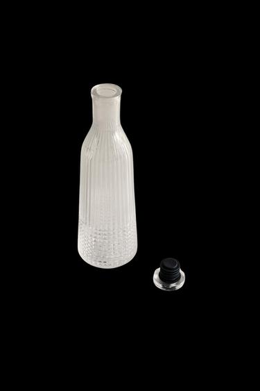 GLASS BOTTLE WITH RELIEF DESIGN - 990 by Zara