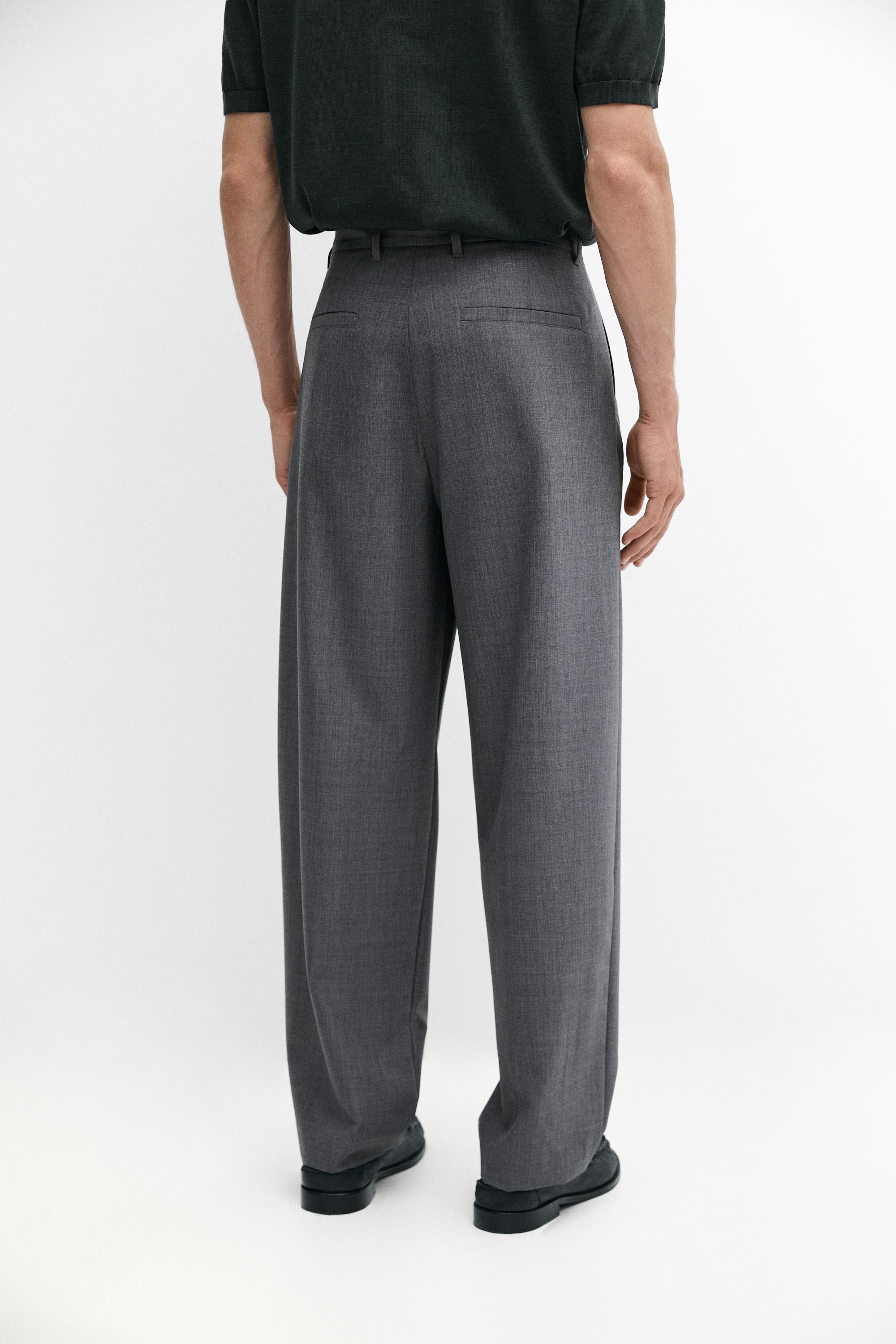 Pantalon relaxed fit à pinces en laine froide