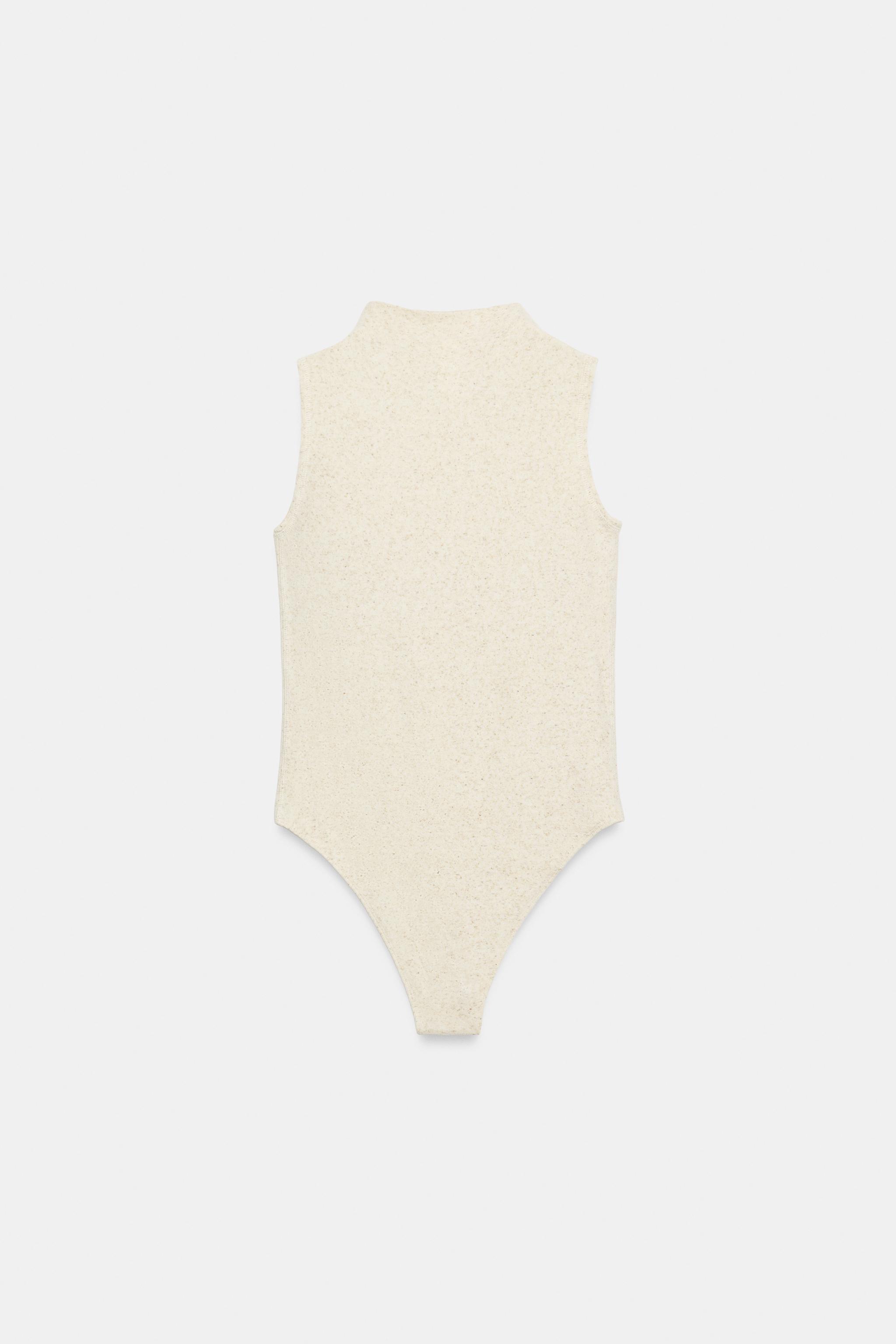 SLEEVELESS BODYSUIT