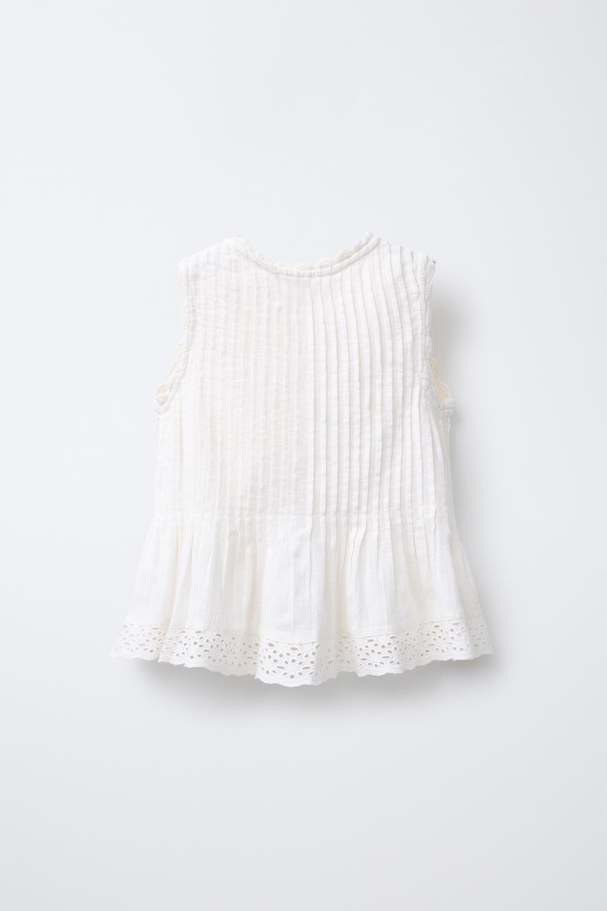 SHIRT WITH PINTUCKS AND EMBROIDERY