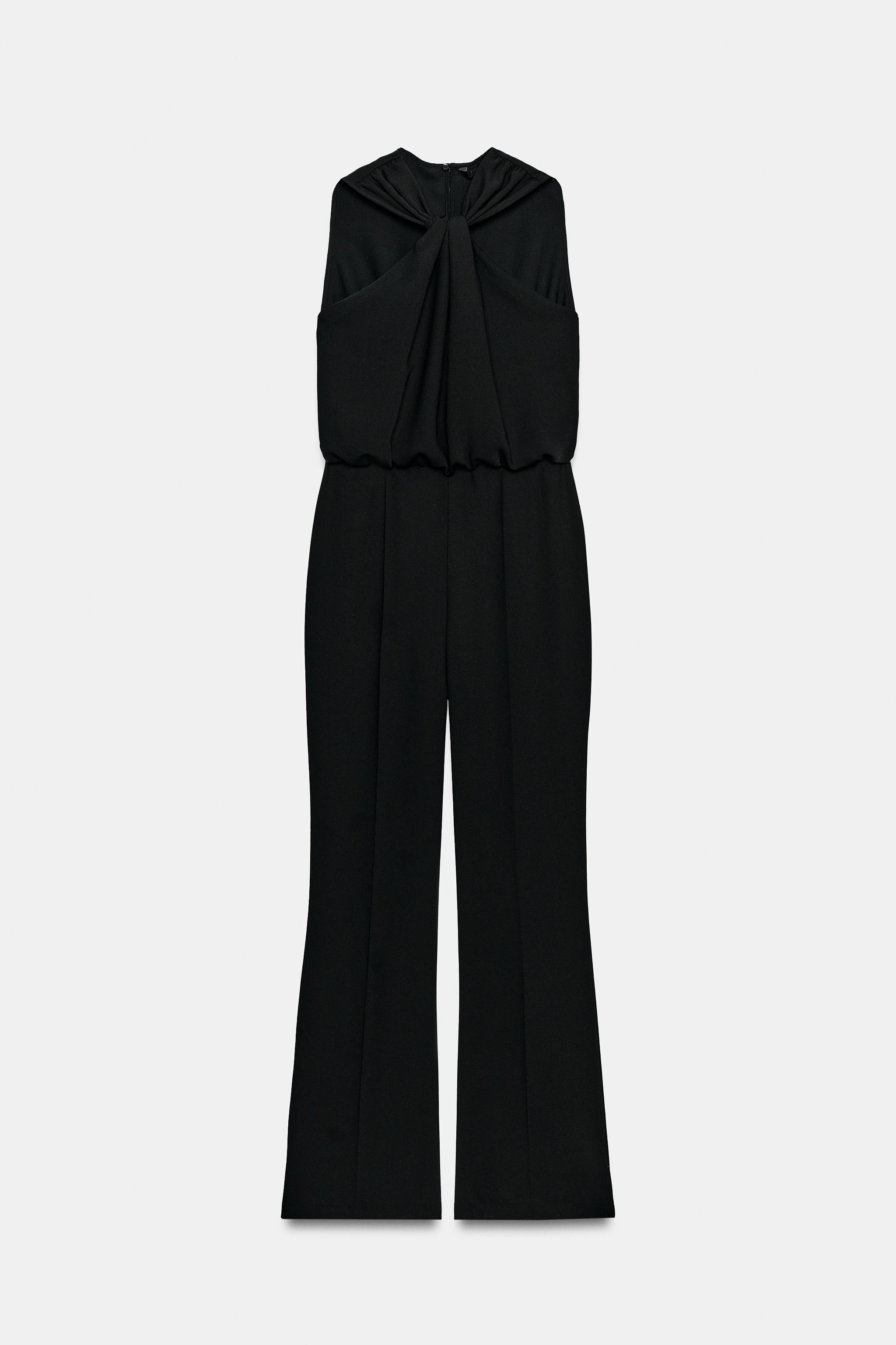 TWISTED NECK FLARE JUMPSUIT