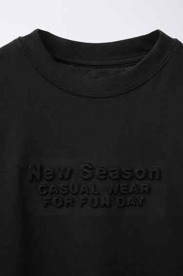 T-SHIRT WITH RAISED SLOGAN - Black by Zara - Image 2