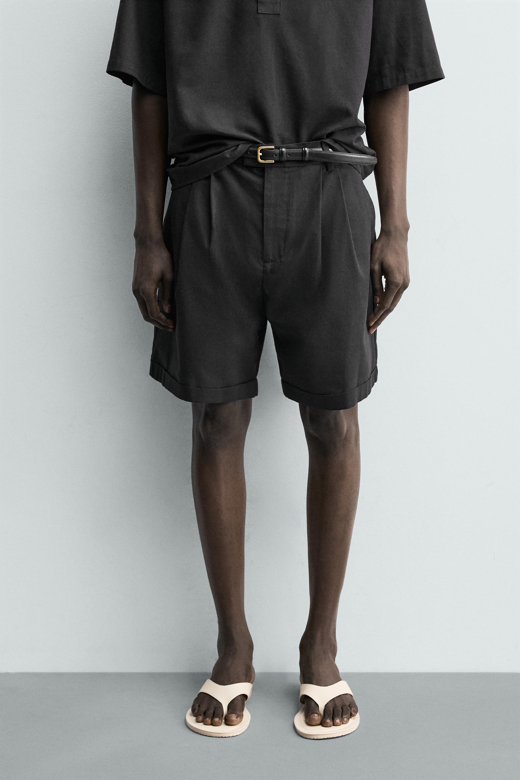 RELAXED FIT PLEATED SHORTS