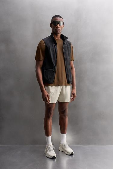 SHORTS RUNNING COLOR BLOCK - Blanco roto de Zara