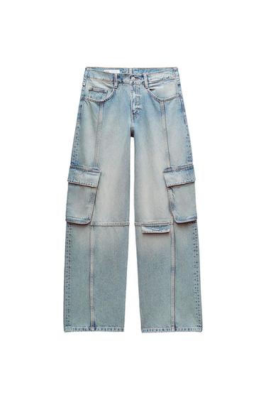 Light blue denim cargo pants with large leg pockets and a straight cut, on a white background.
