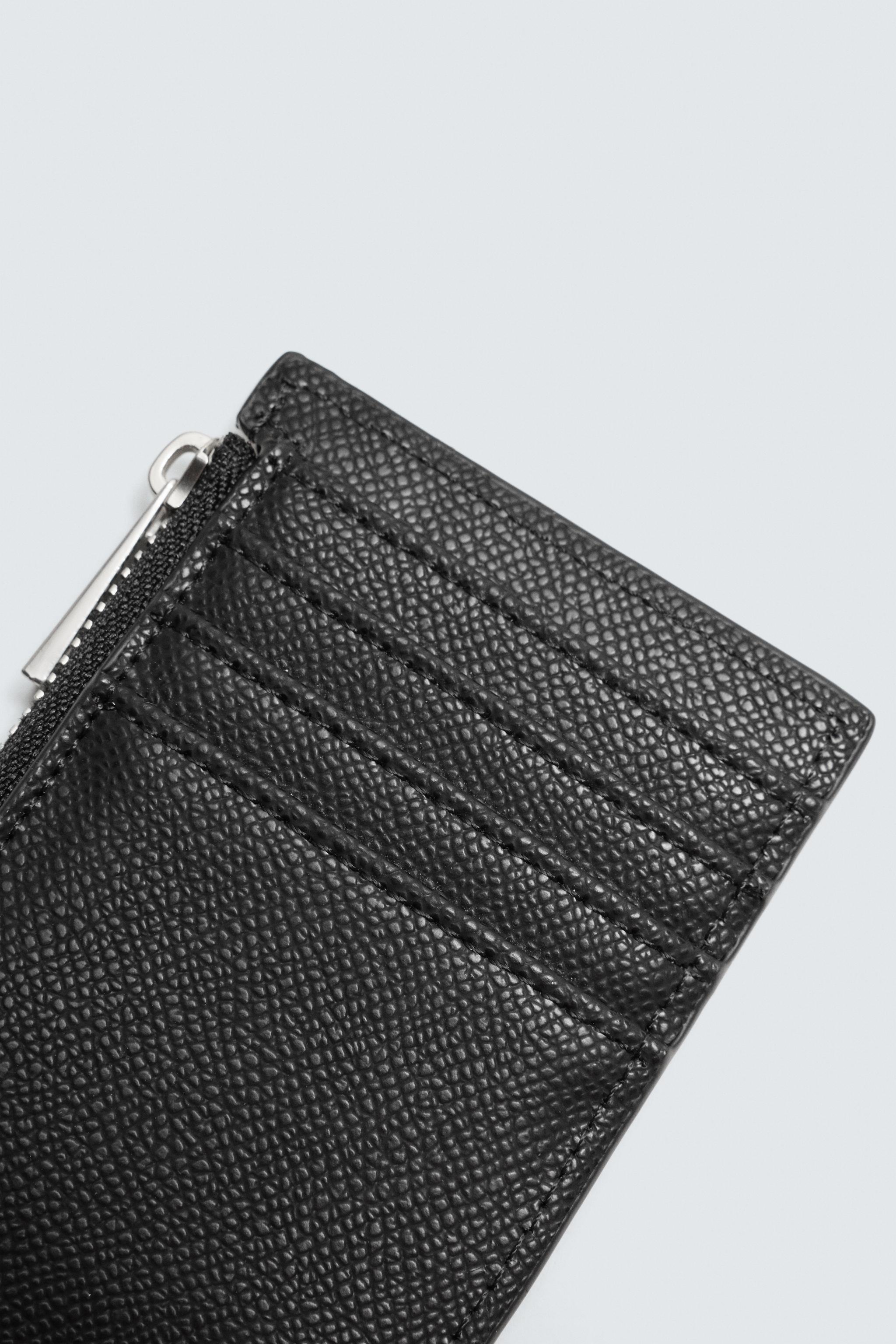 EMBOSSED CARDHOLDER