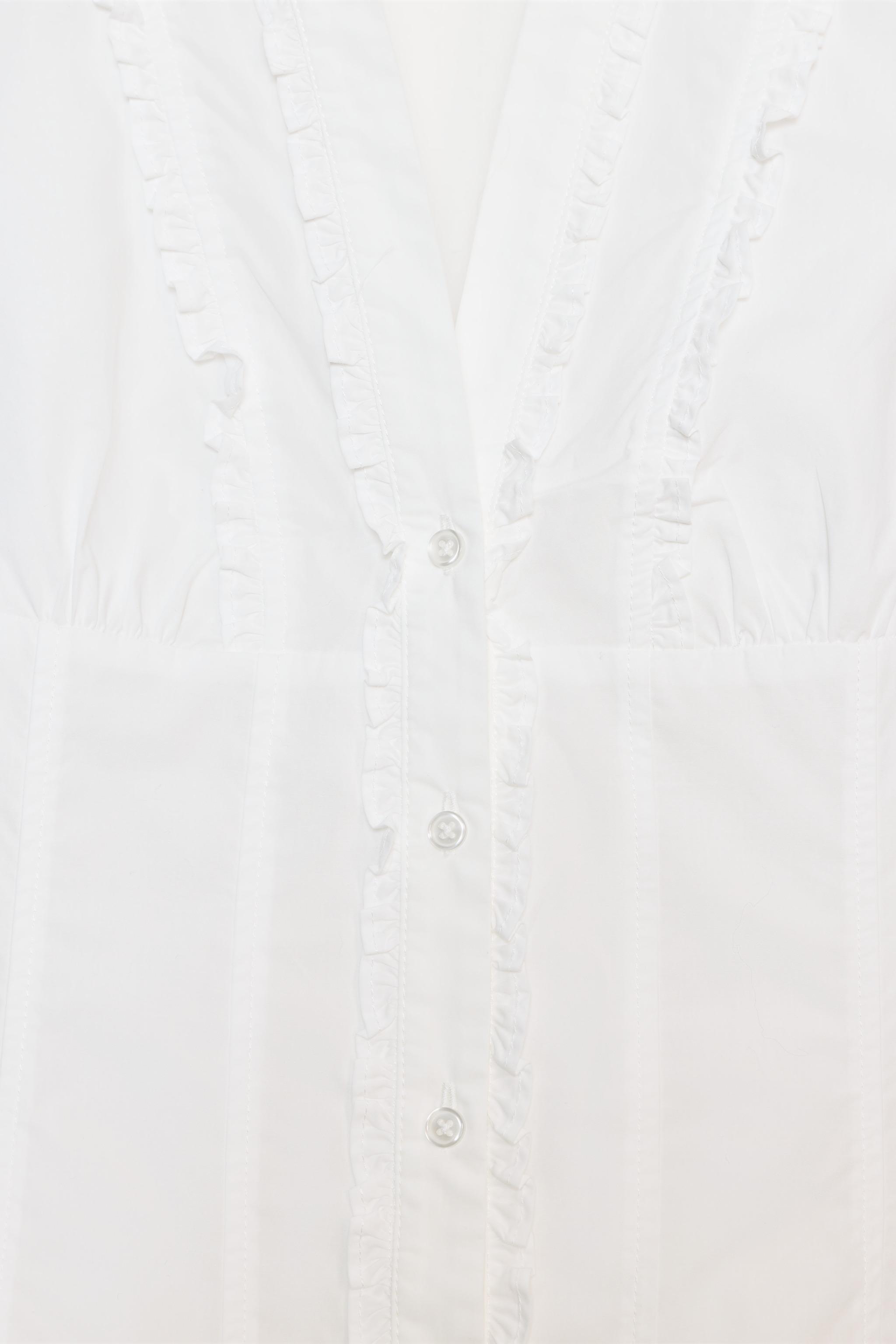 CHEMISE EN POPELINE À VOLANTS
