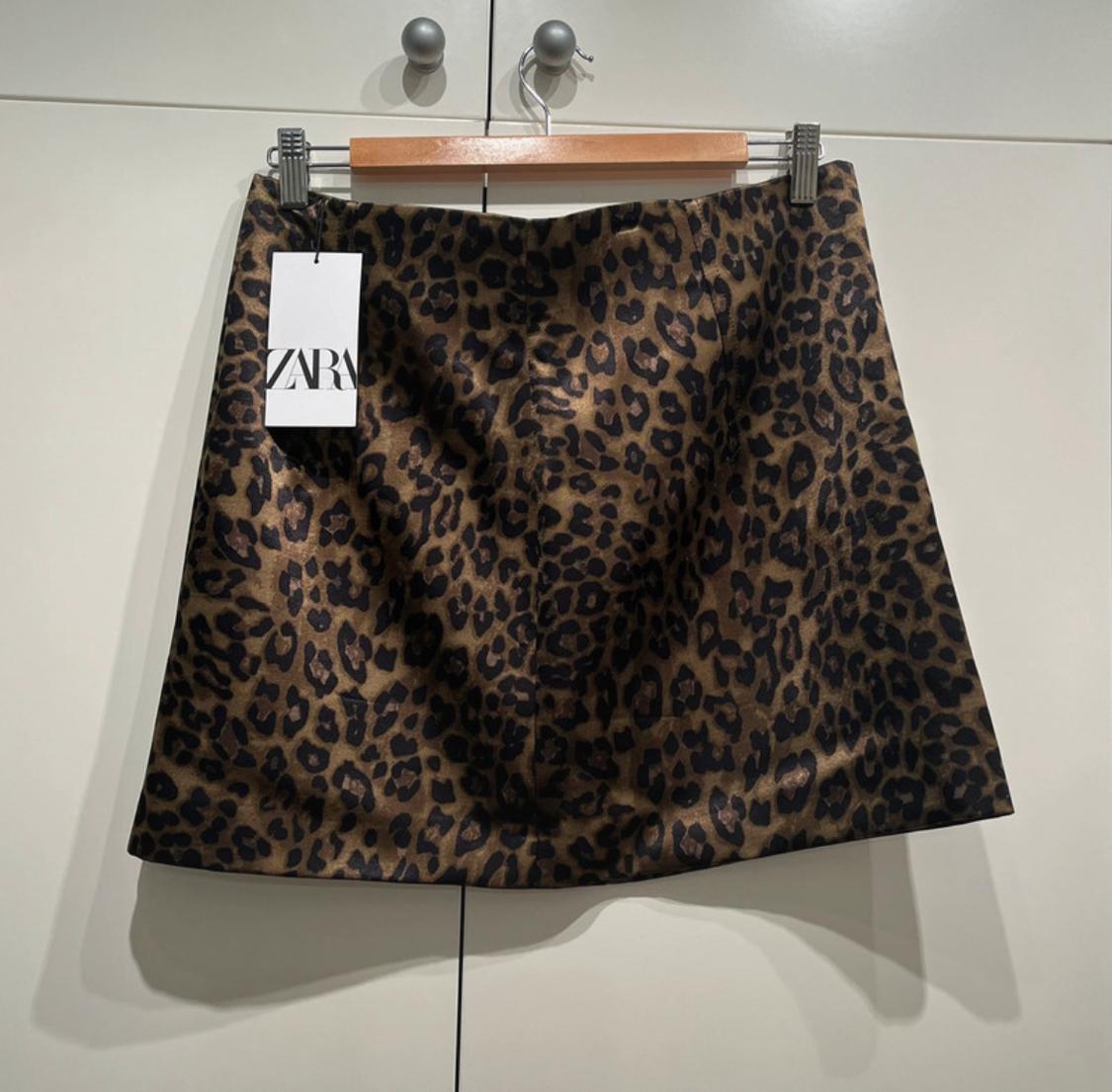 LEOPARD PRINT MINI SKIRT