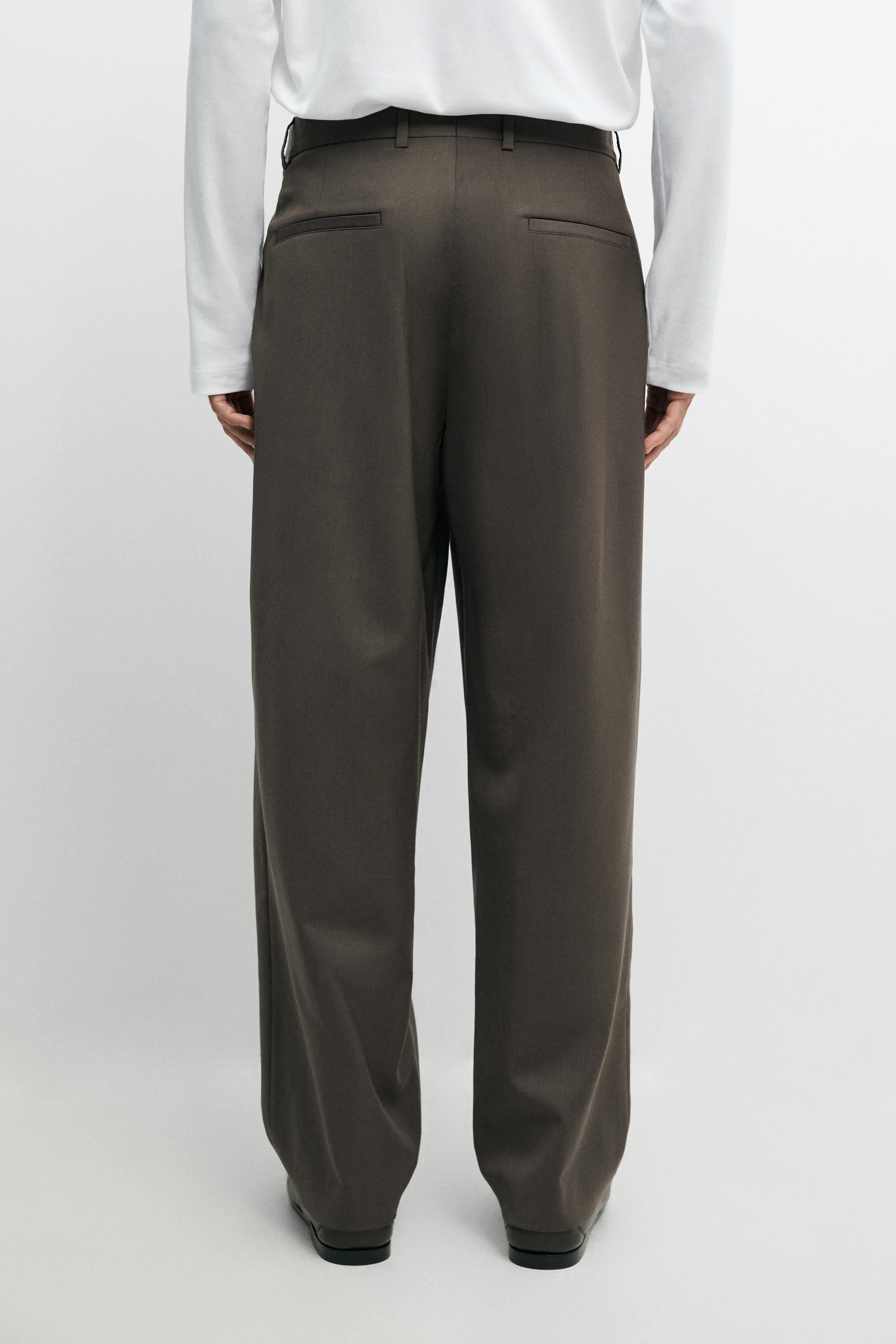 Pantalon relaxed fit à pinces 100 % laine froide