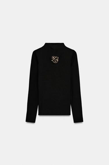 تيشرت ببروش وياقة بيركينز - أسود الخاص بـ Zara