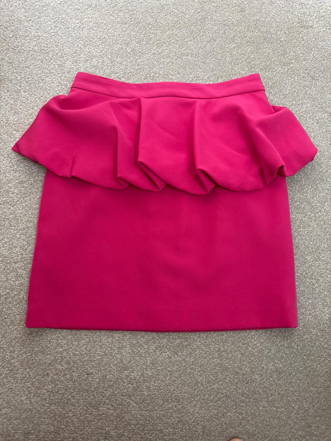 MINI SKIRT WITH FLOUNCED DETAIL