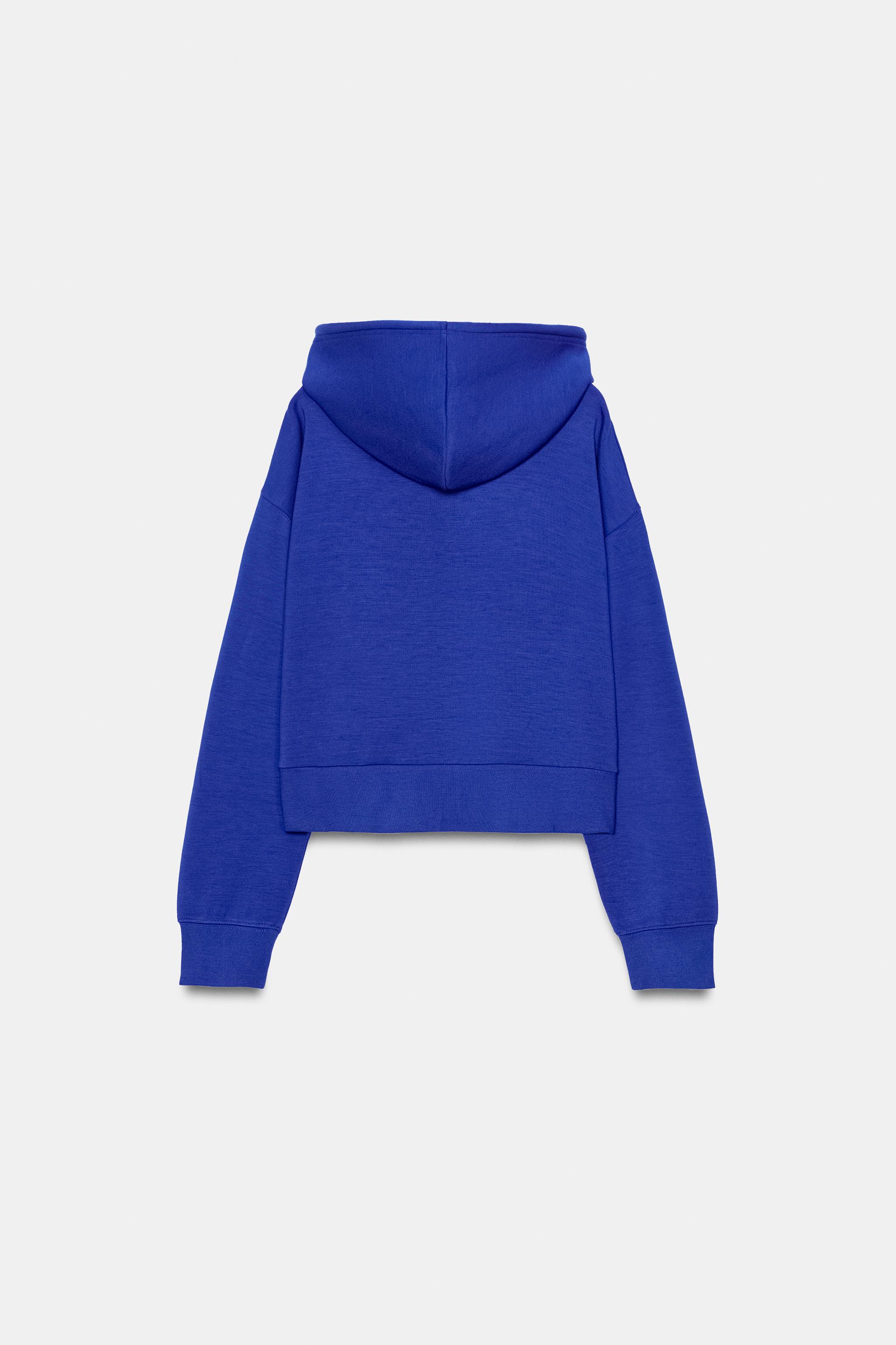 SWEAT INTERLOCK À CAPUCHE