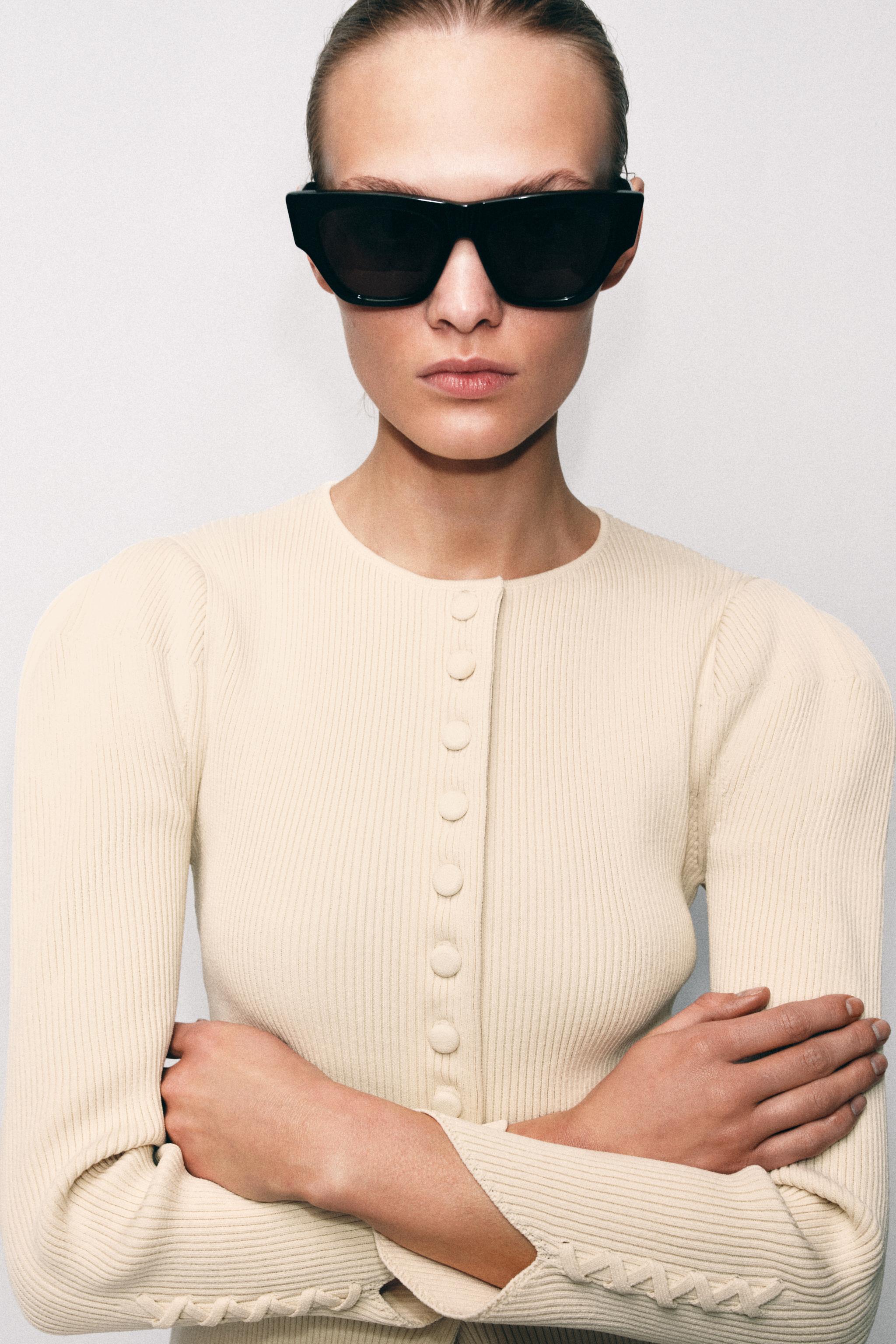 VESTE EN MAILLE À MANCHES BOUFFANTES