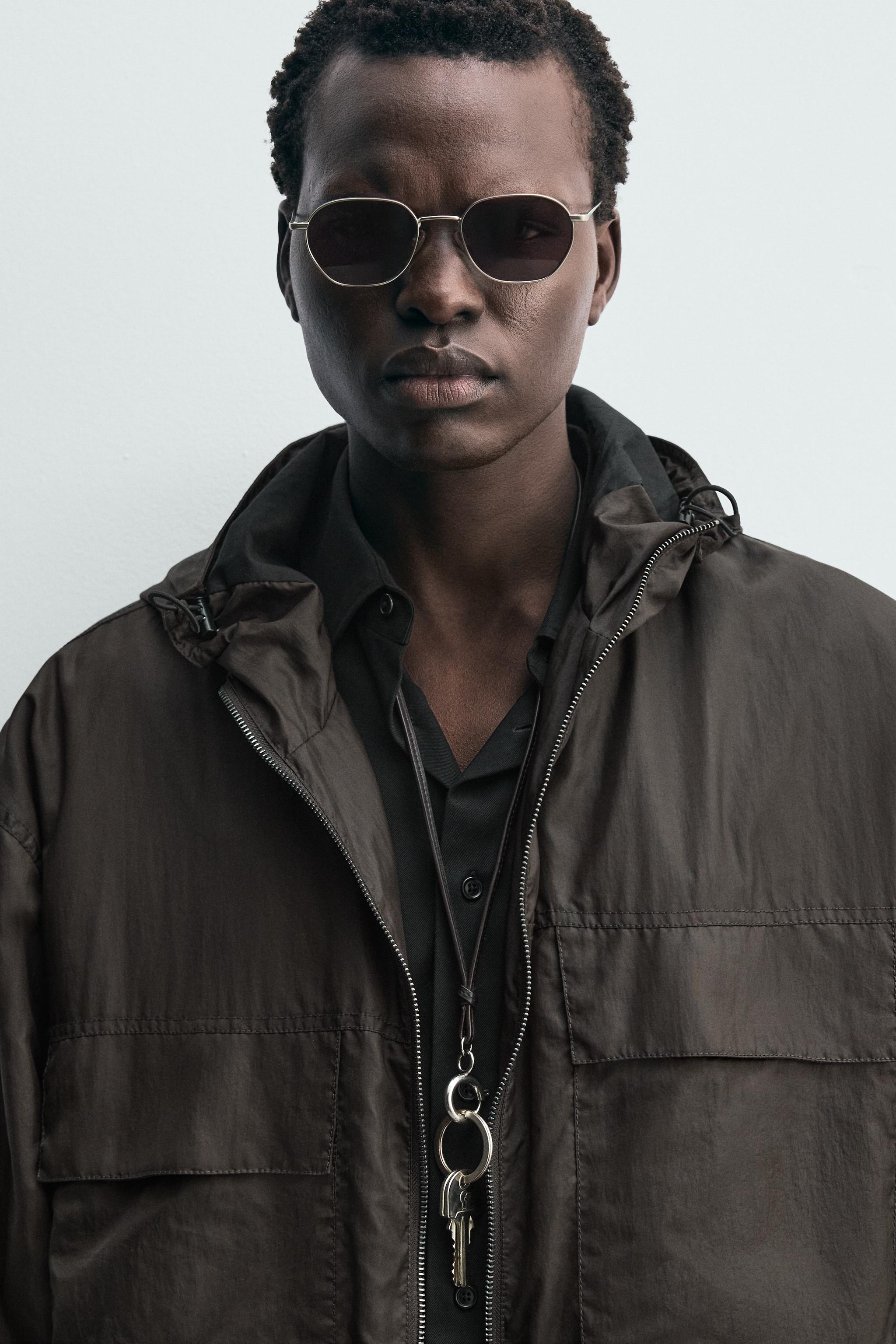 BLOUSON TECHNIQUE À CAPUCHE