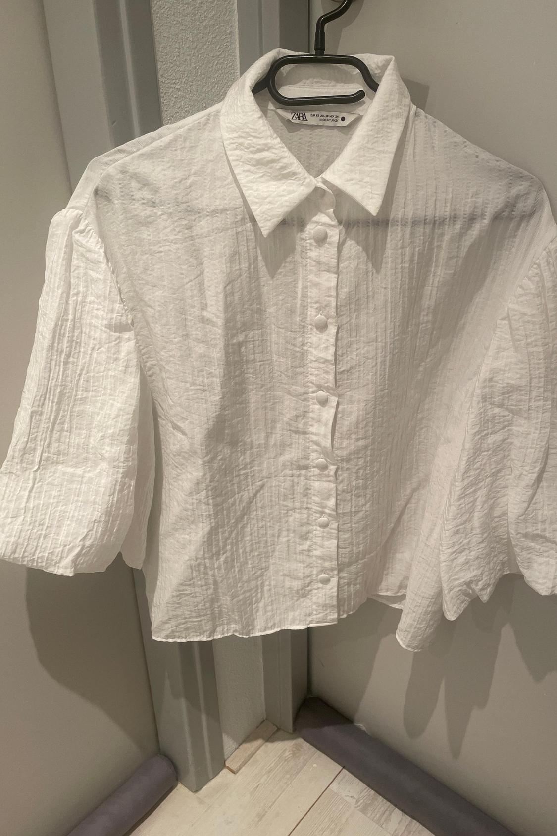 TEXTURED BLOUSE