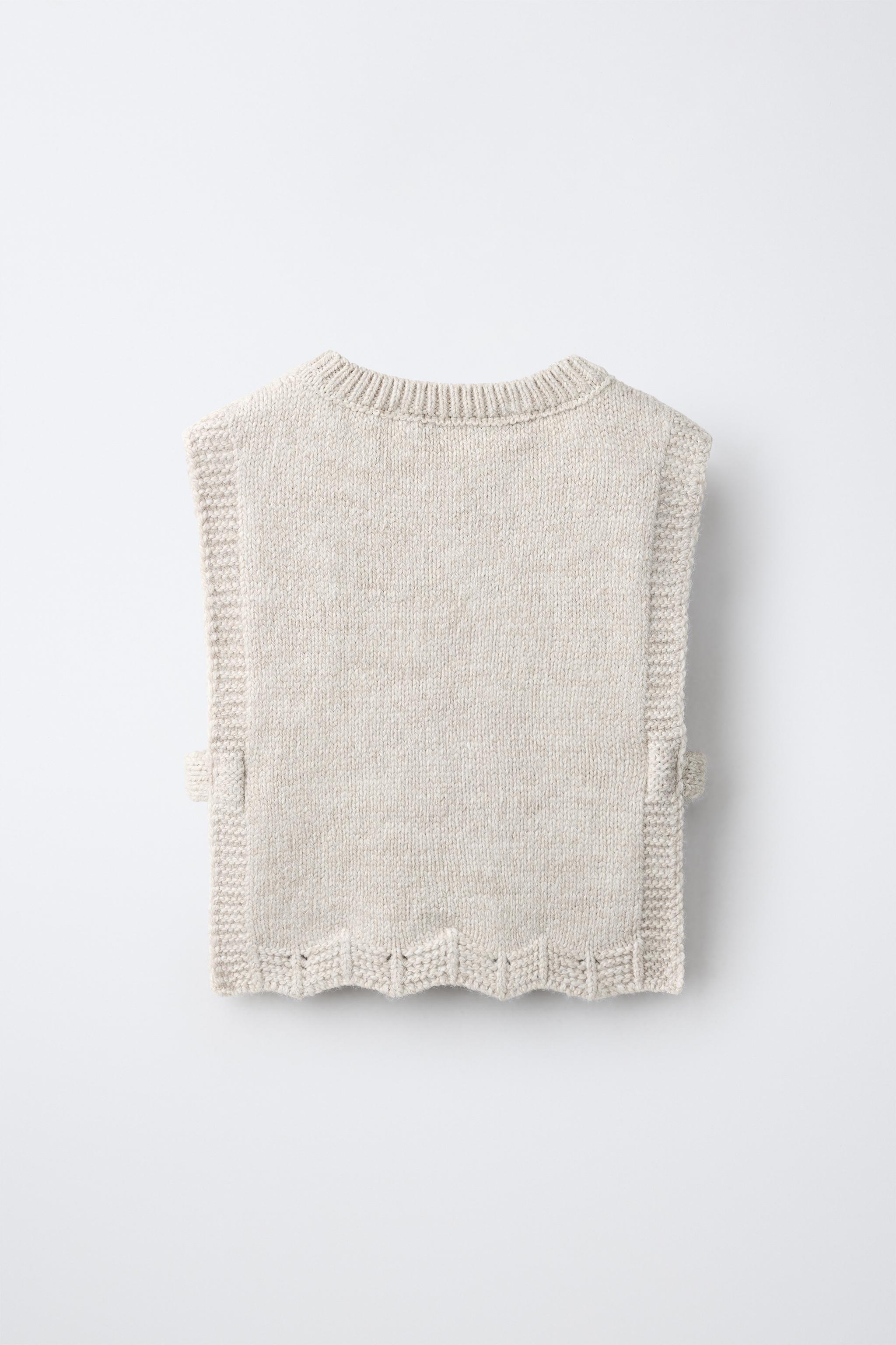 CABLE KNIT VEST