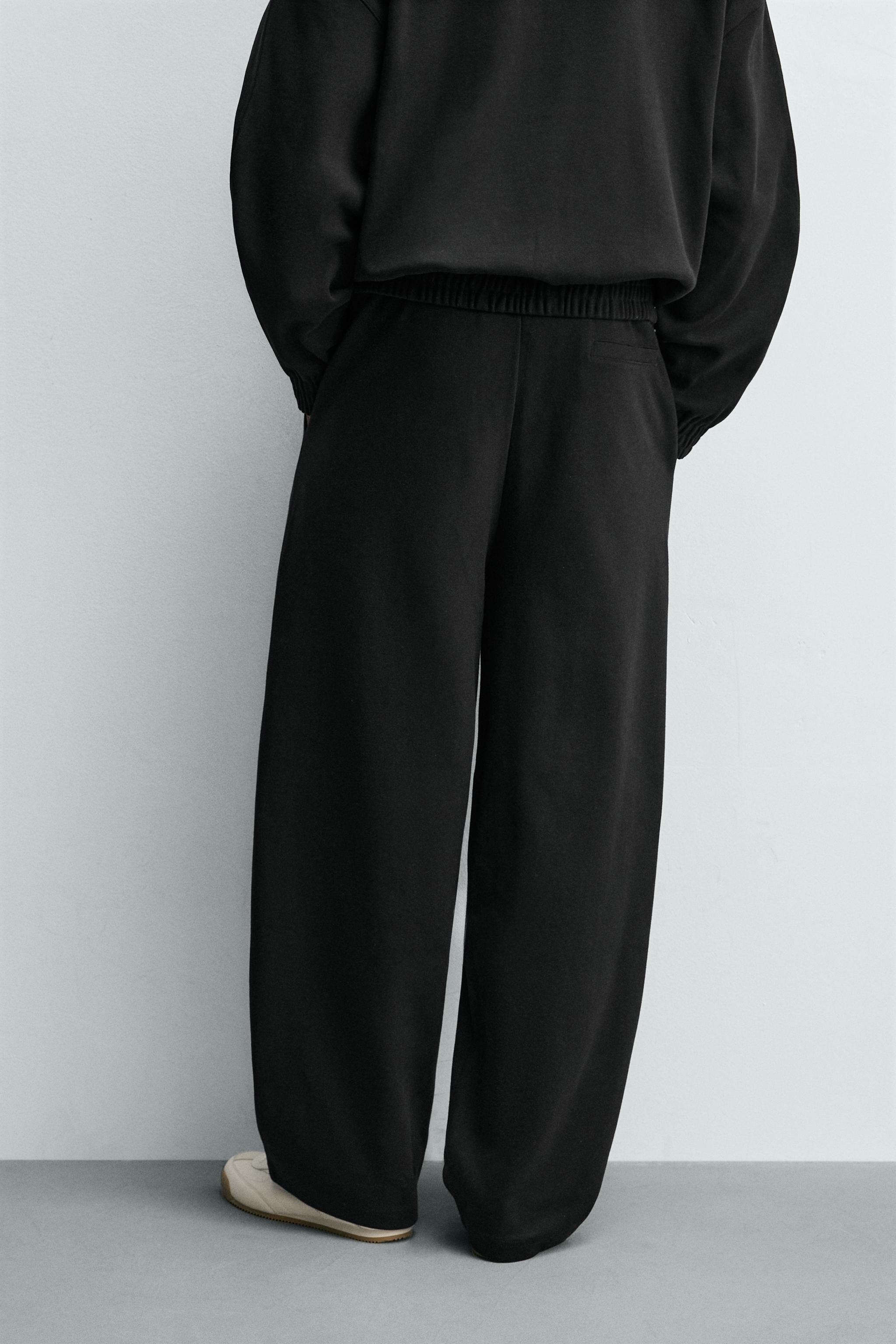PLEATED WIDE FIT JOGGER PANTS