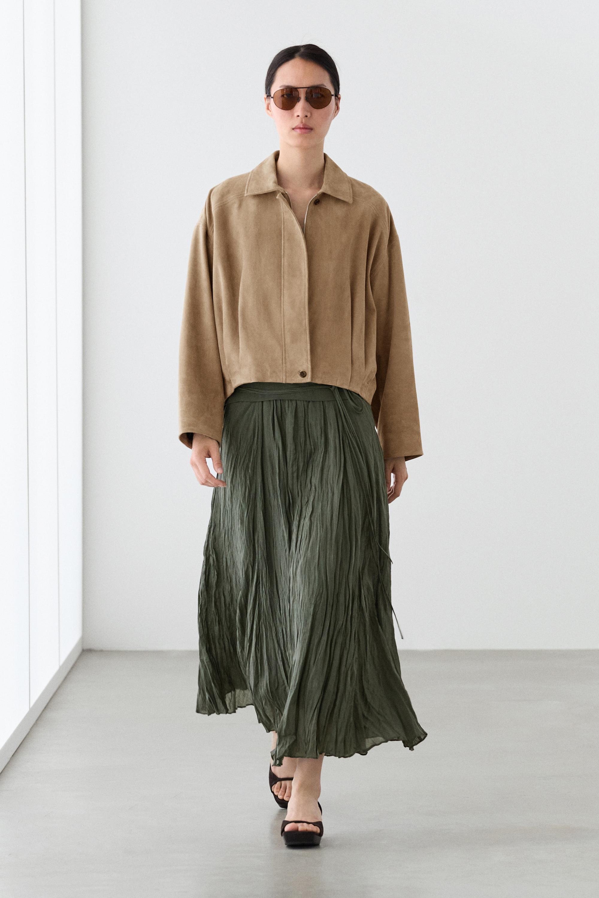 Blouson bomber plissé en cuir et daim