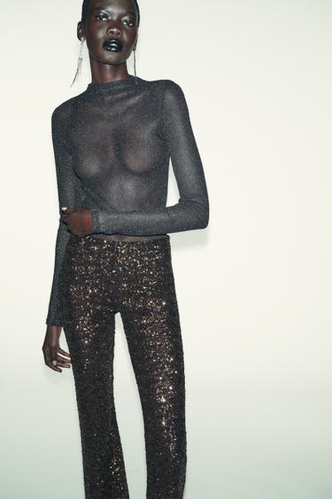 LEGGINGS FLARE LENTEJUELAS - Cobre de Zara