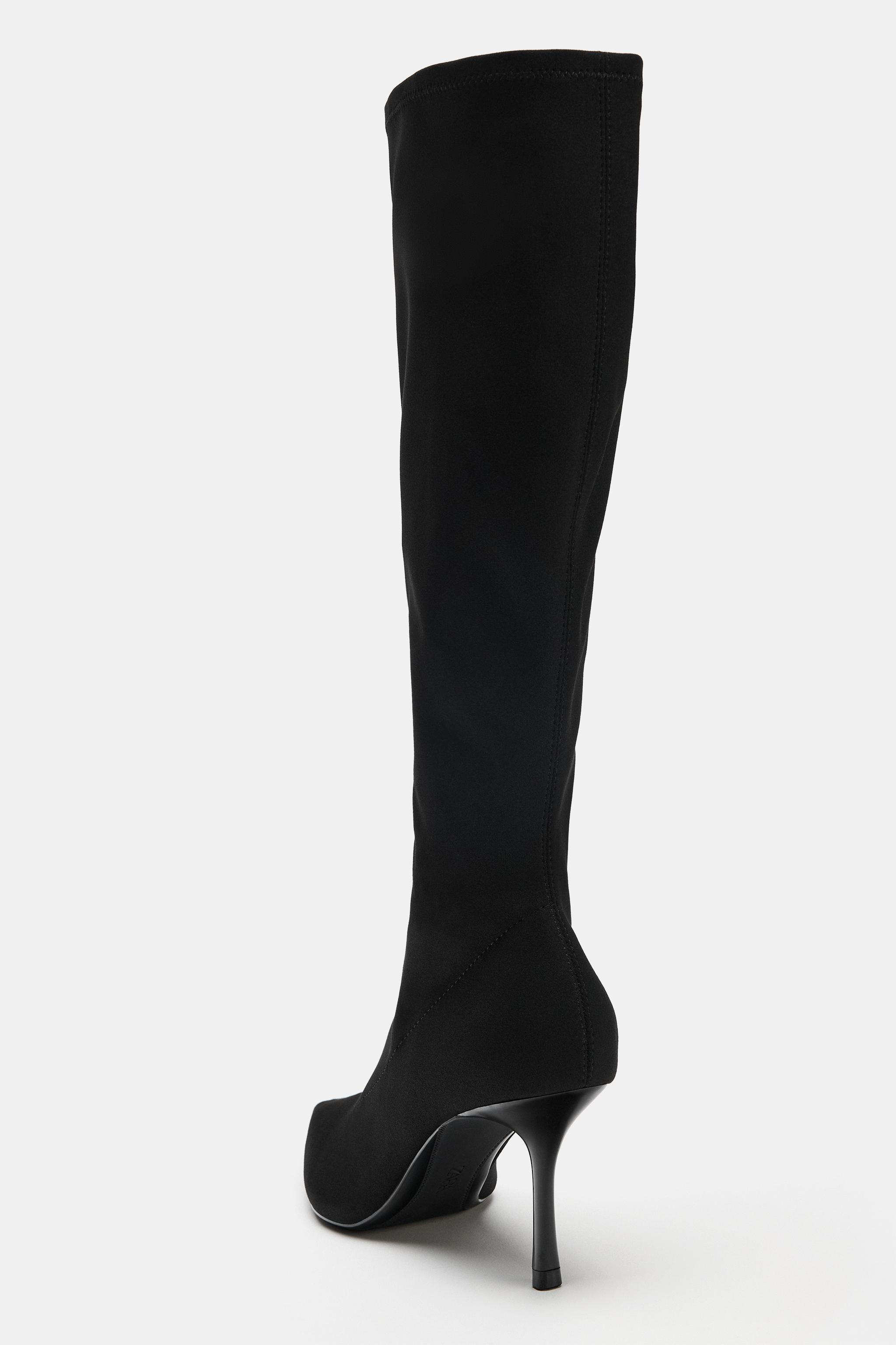 STRETCH HEELED BOOTS