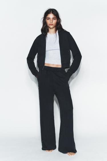 بنطلون قطيفة بمظهر مغسول وتفاصيل مرصعة - فحمي الخاص بـ Zara