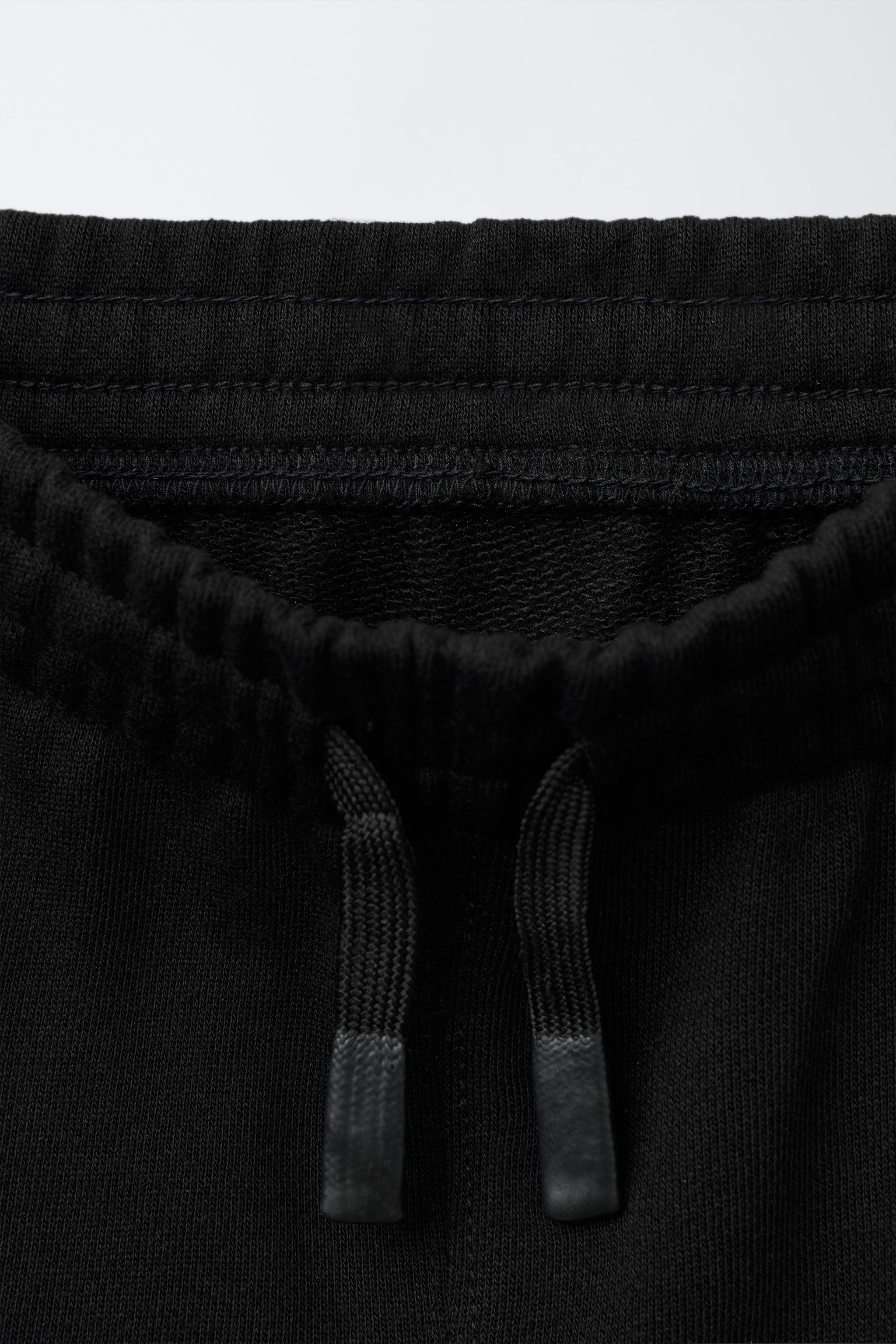 STRAIGHT FIT GARMENT DYE PLUSH SHORTS