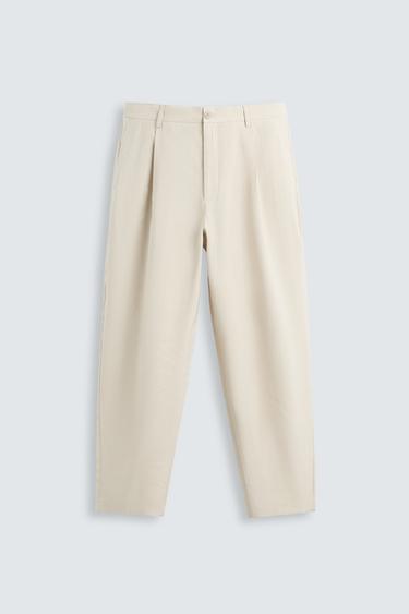 PANTALÓN FLUIDO PLIEGUES - Beige claro de Zara