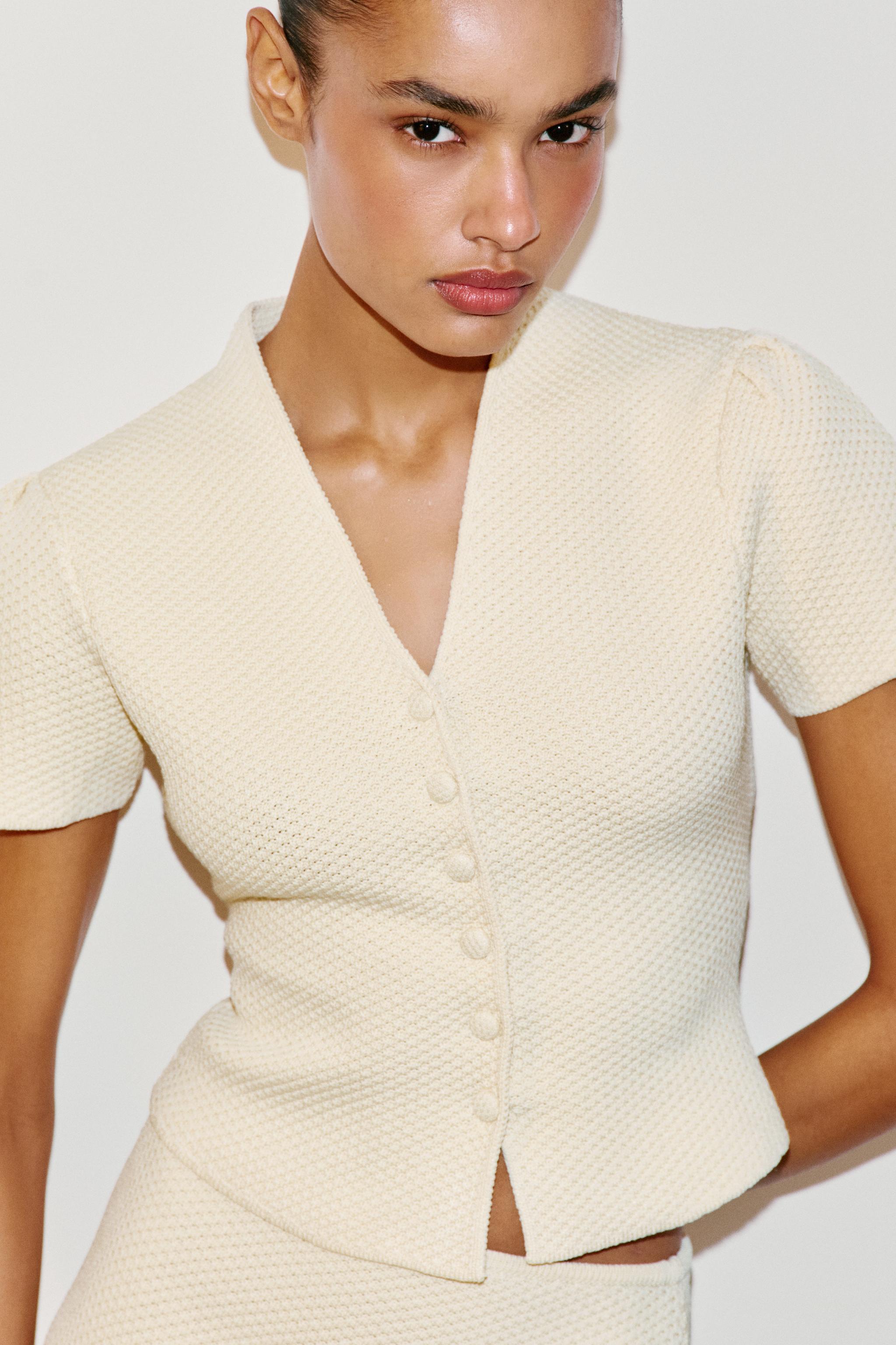 VESTE STRUCTURÉE EN MAILLE