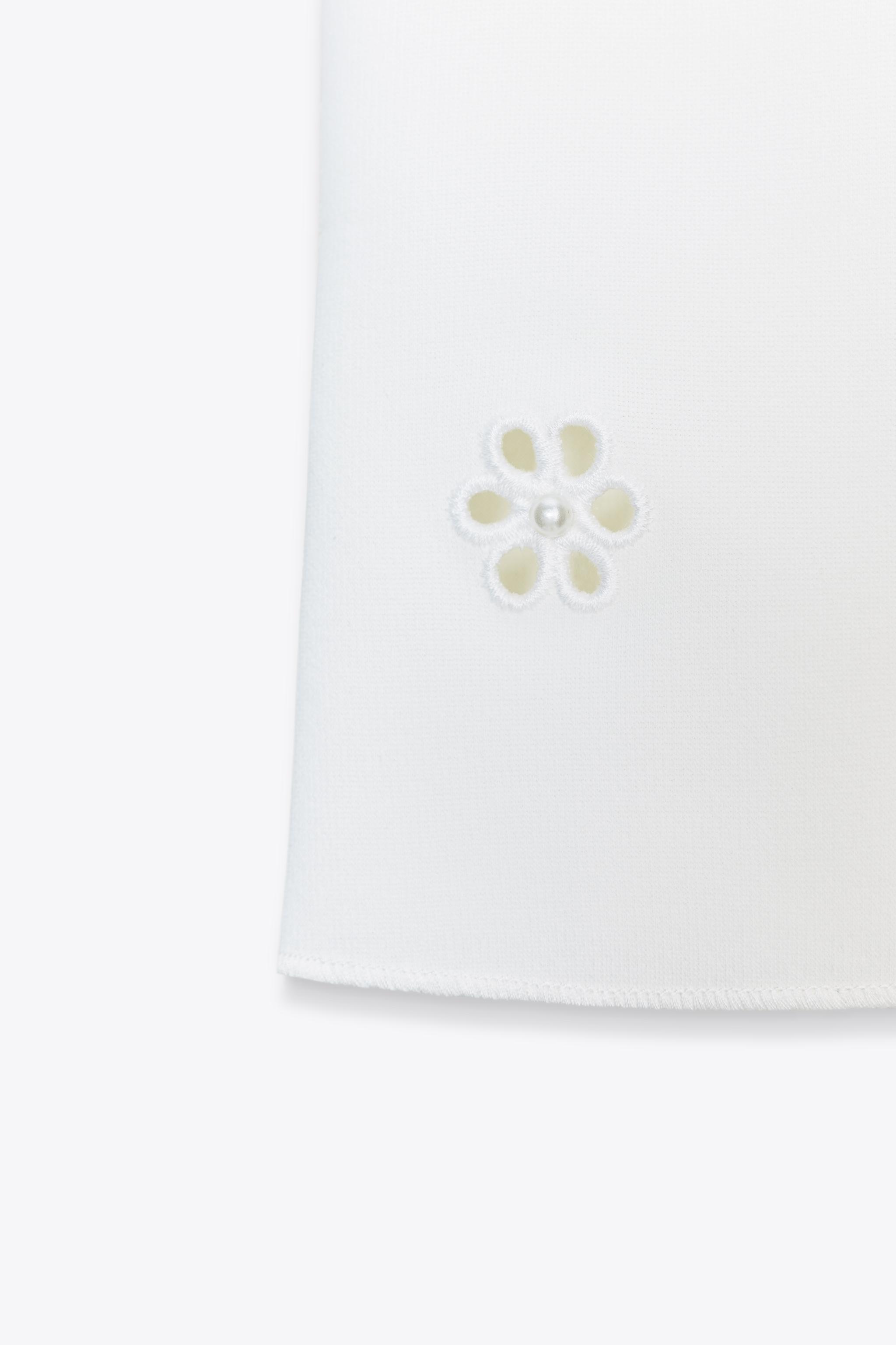 TOP STRETCH BRODERIES FLEURS