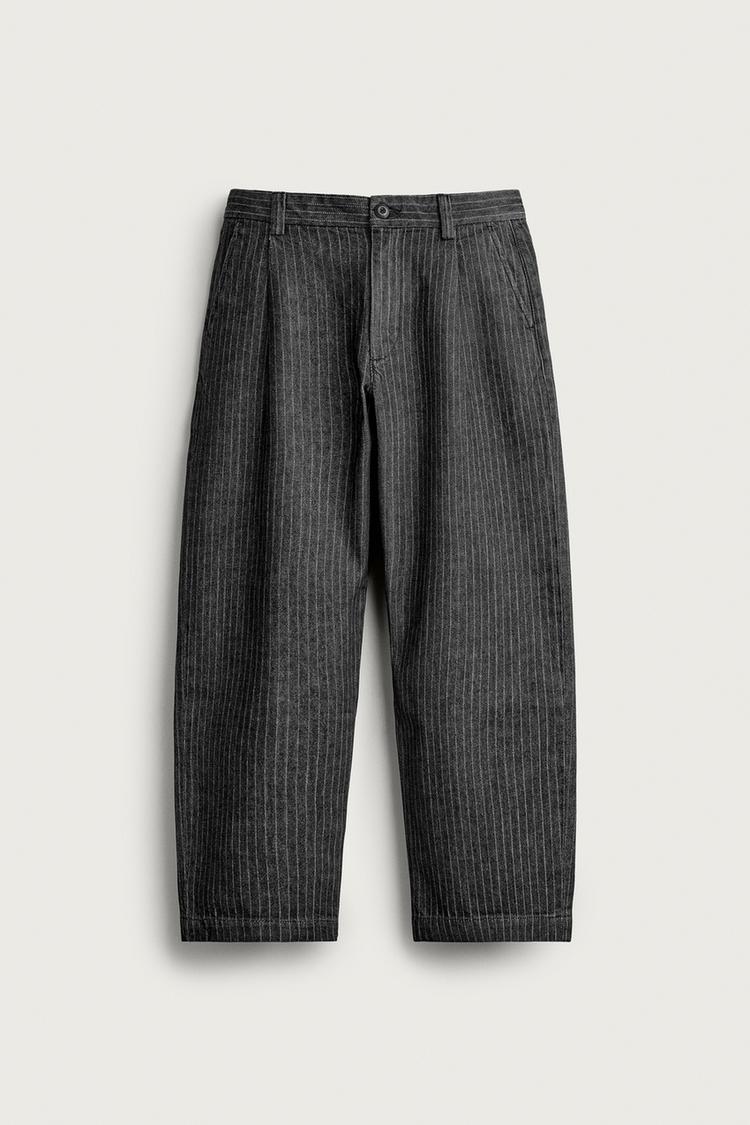 Pantalon chino relaxed fit pliegues