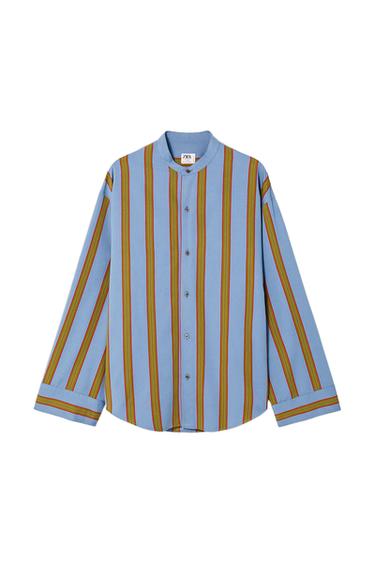 Blue shirt with multicoloured vertical stripes and a grandad collar. Long sleeves with folded cuffs. Visible label on the collar.