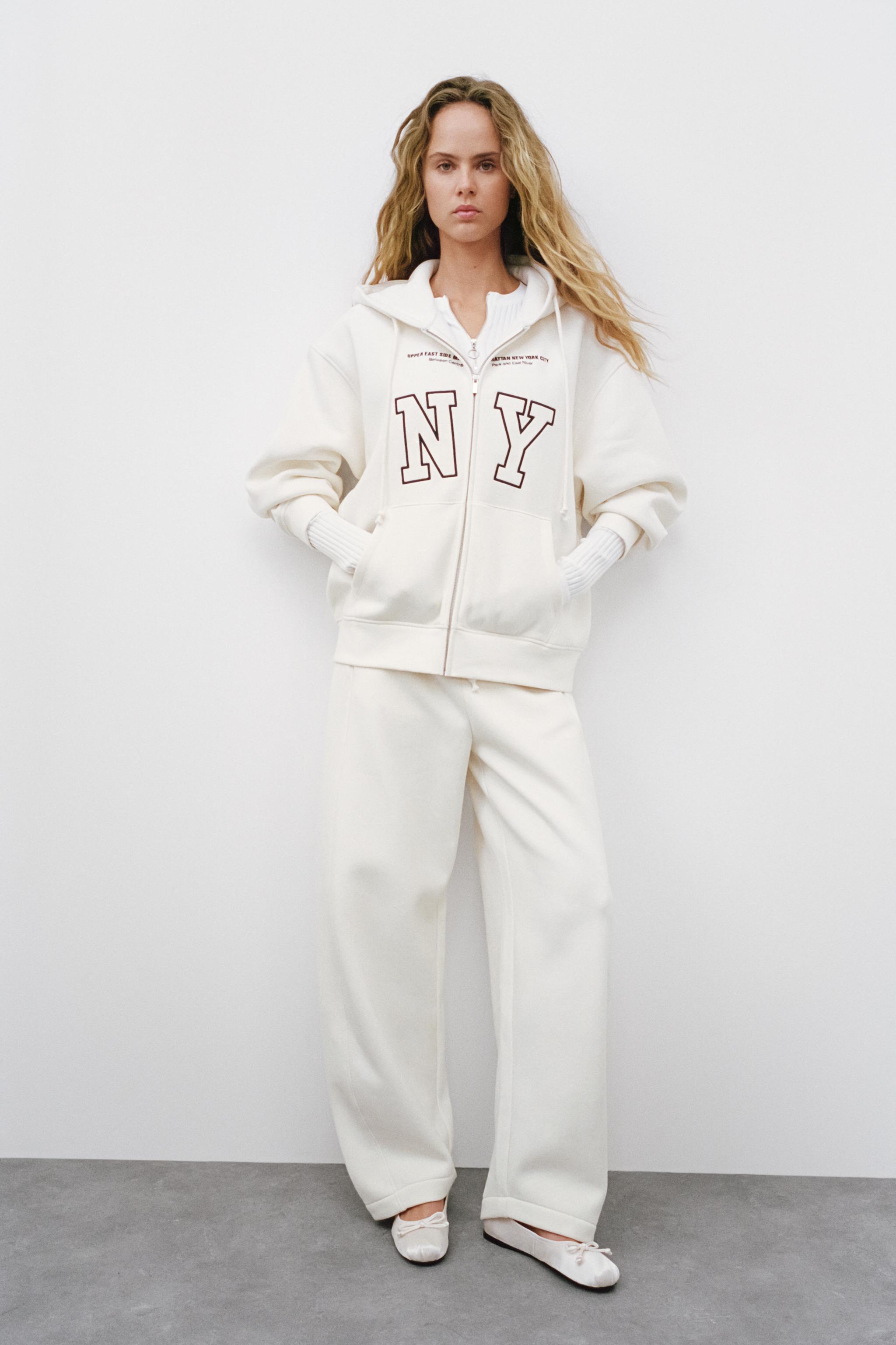 PLUSH JOGGERS WITH EMBROIDERED SLOGAN - Light ecru