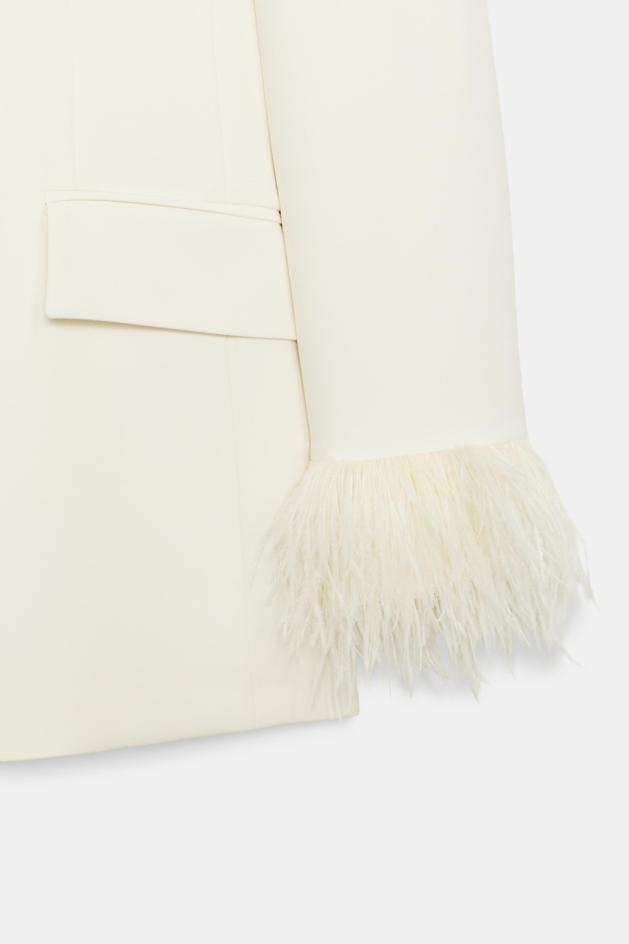 BLAZER WITH FEATHER CUFFS