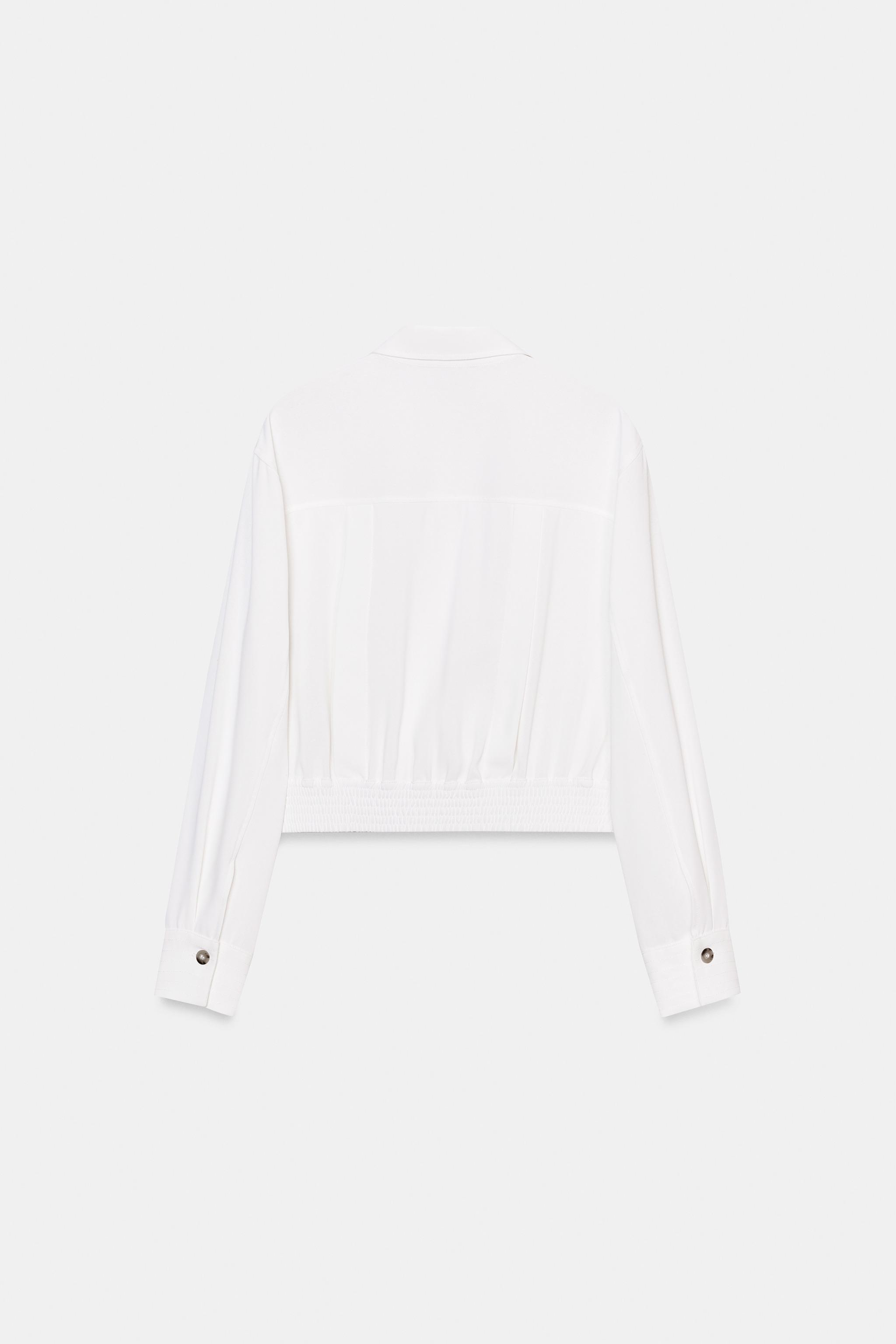 CHEMISE COURTE À PATTES D'ÉPAULES