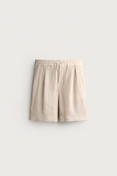 برمودا RELAXED FIT بارز الملمس - بيج فيجوريه الخاص بـ Zara
