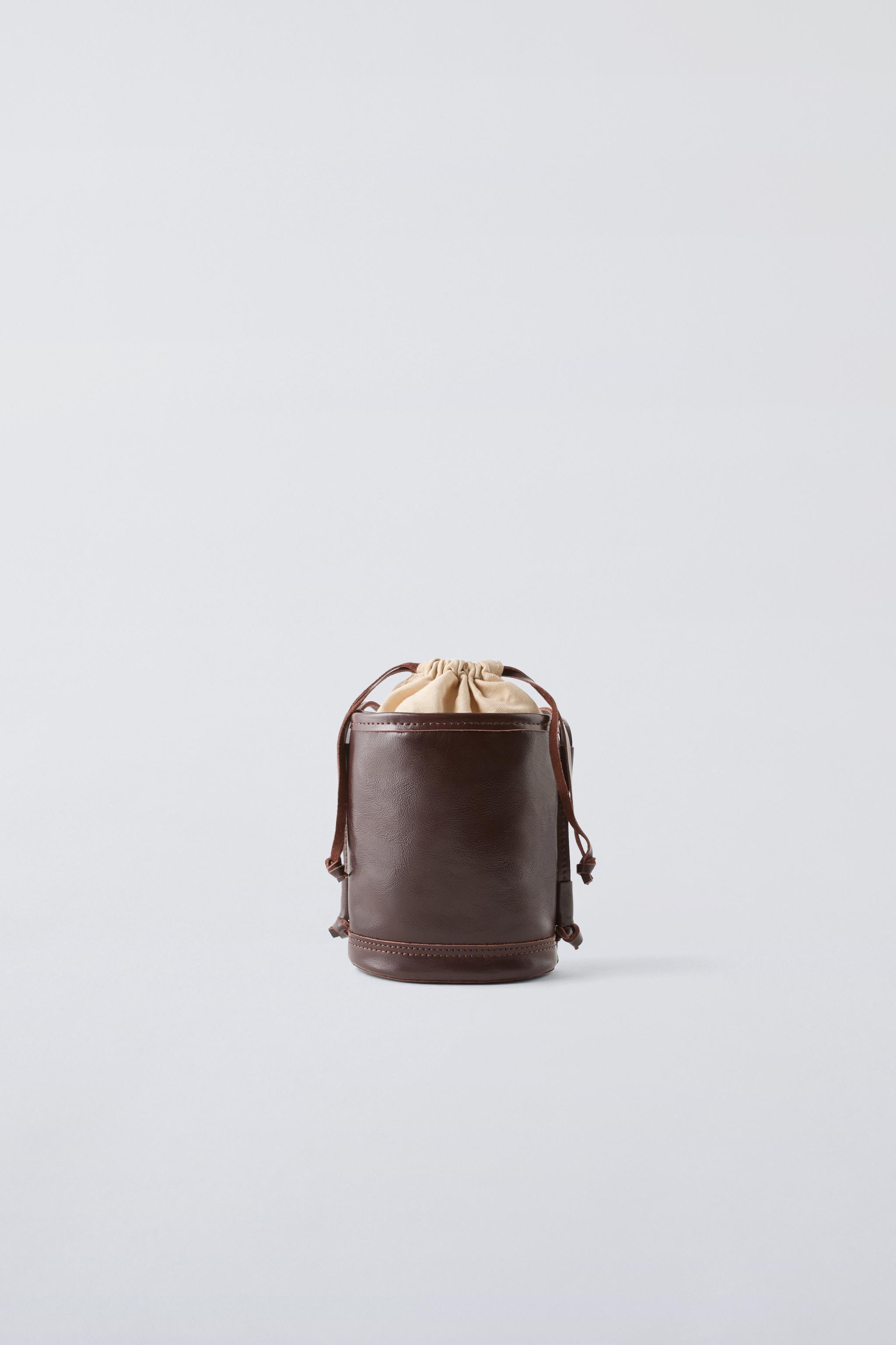 LEATHER BUCKET CROSSBODY BAG